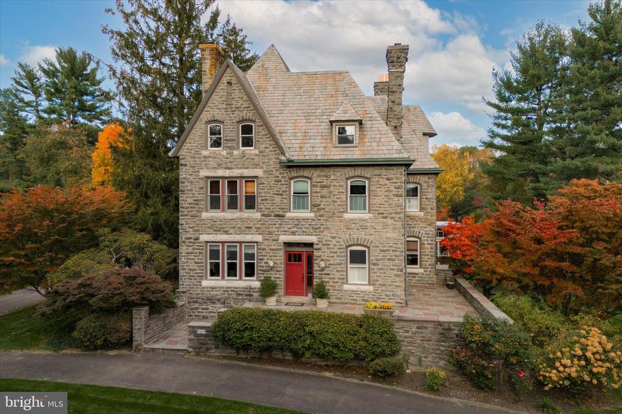 Nestled into the village of Chestnut Hill, this well-maintained and magnificent Queen Anne Victorian style residence was designed in 1889 by the Hewitt Brothers, architects. This distinguished home has a lush front lawn and garden, a circular driveway, and flagstone steps leading to a front terrace and the main entrance.

The entry hall and living room of this residence have 10' high ceilings; the oversized windows offer abundant natural light. There are cozy fireplaces in most rooms and an exceptional floor plan ideal for hosting memorable gatherings. Throughout this captivating residence, you'll discover spacious rooms and a total of seven exquisite tiled and carved fireplaces. Beyond the grand staircase is the dining room with a bay window, an original butler's pantry and an updated kitchen, offering ample storage, granite countertops, and a marble-top island with bar stools. Across from the kitchen is an all-season room that seamlessly extends the kitchen, providing an informal dining area and a comfortable gathering space. The first floor offers additional living spaces, including a wood-trimmed den/media room, a convenient powder room, and a discreet laundry room area that leads to the rear garden, deck and patio.

Ascending to the second floor, you'll find a well-appointed primary suite with its own marble-walled bathroom, dressing room and a spacious bedroom. The next two rooms offer versatility and could easily serve as studies or as additional bedrooms. A second floor laundry room can be found at the rear along with two full bathrooms and a bedroom. This floor truly epitomizes spacious luxury and convenience. The third floor has four bedrooms and two additional bathrooms. Many windows in the house are thermal pane.

Outside, the grounds are a true oasis, featuring an irrigation system for the front and rear lawns, mature perennial flower beds, majestic trees, and an ambiance of privacy. A detached two-car garage with added driveway parking can be found at the rear of the property providing ample space for your bikes and other vehicles.

Seminole Street is one of the most coveted streets in Chestnut Hill due to it's natural and architectural beauty and unparalleled convenience. It is right around the corner from Pastorious Park for dog walks, summer concerts and just a few blocks from Chestnut Hill's vibrant shopping and entertainment district along Germantown Ave. This location also features easy access to the gorgeous foot trails of the Wissahickon Valley and the Valley Green Inn. This grand home is a testament to timeless elegance and modern convenience, and is now ready to welcome its next proud owner. Don't miss the opportunity to make this home yours.