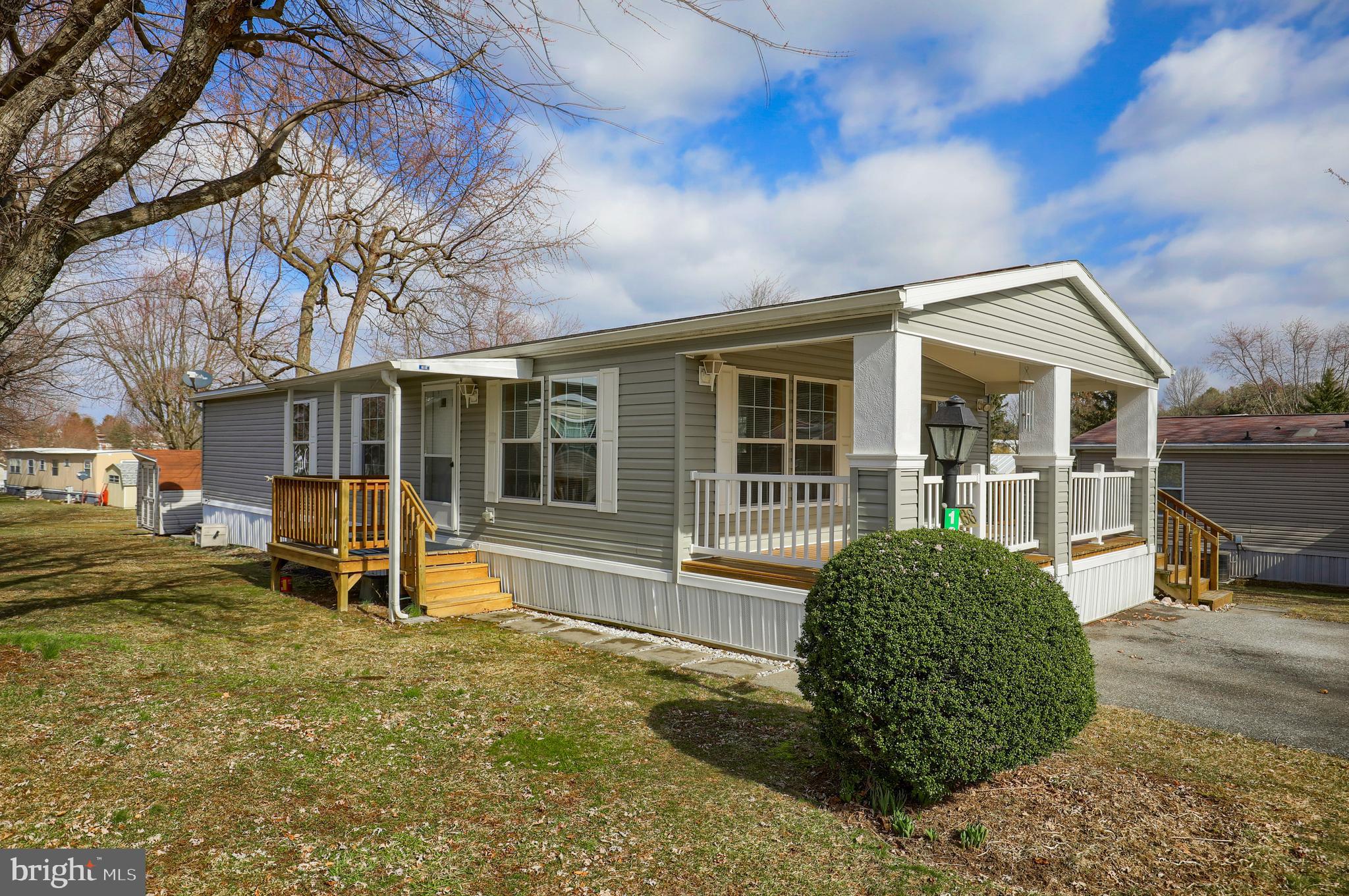 Check out this affordable 3 bedroom double wide located in the Starview Countryside Community featuring new carpet, a large covered front deck and a bright and open kitchen and dining room layout, great for entertaining. As you enter the home you will be greeted by the spacious living room, dining room with sliding glass door leading out to the deck and a nice kitchen with oak cabinetry and appliances. The master bedroom offers a 7 x 4 walk in closet with organizer and a private bath with separate makeup area. Two additional bedrooms, laundry room with washer and dryer and a full bath. Covered side porch, off street parking and a Black Bear storage shed. Schedule your private tour today before this home is SOLD!