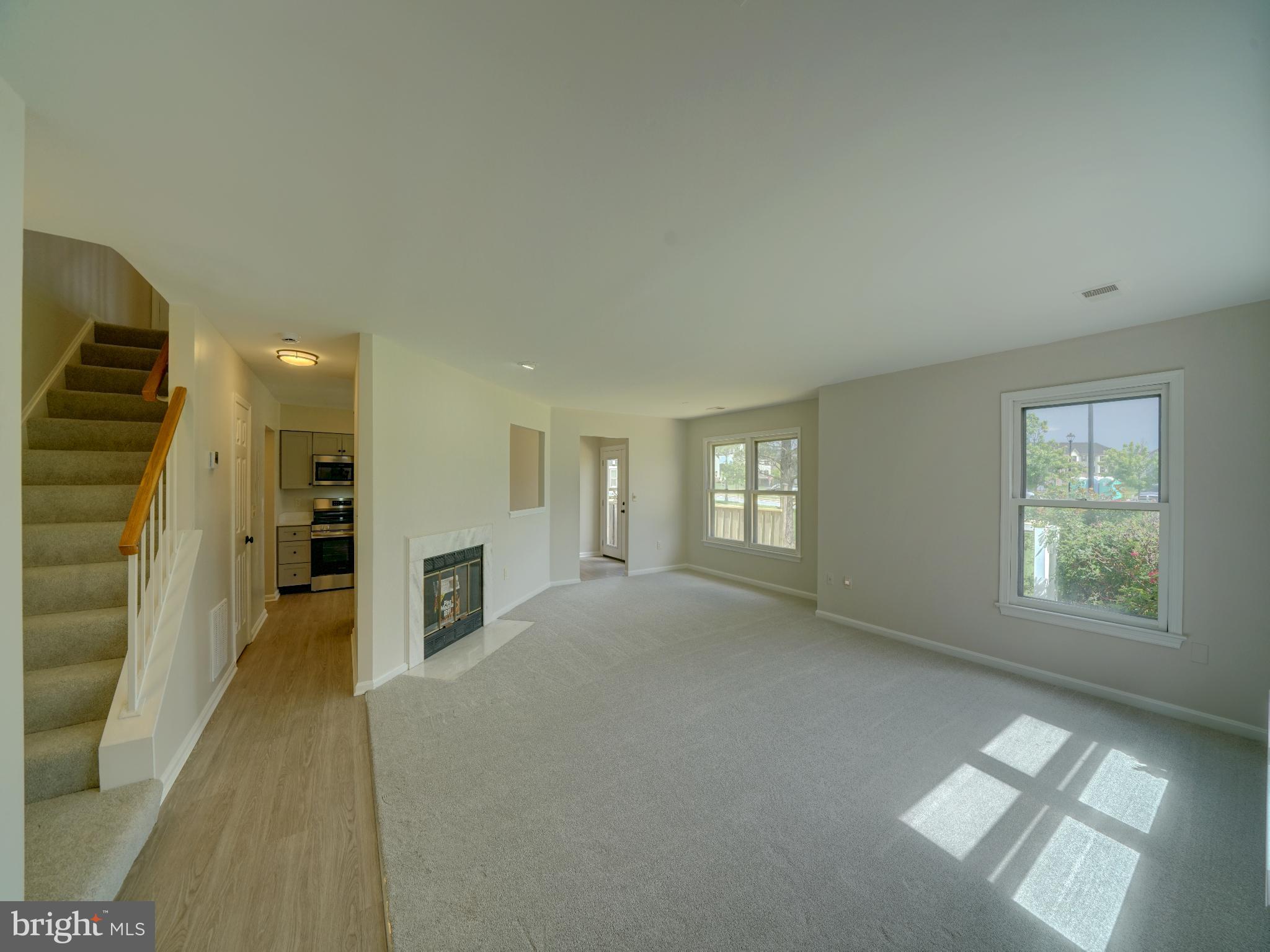 Listed below $345000 appraisal for quick sale! Incredible 3BD/2.5BA garage townhome looking for investors wanting a good deal! Proven long term track record for rental income. This beautiful home will be ready for occupancy with no worries! New flooring, fresh paint, new garage door opener, new kitchen appliances, cabinets and remodeled baths. Move in before school starts. Traditional floor plan with 3 bedrooms, 2 full baths upstairs, including the primary suite with private bath and walk in closet. On the main level you enter from the garage into the kitchen area of the home or guests will use the side door entering into the foyer, overlooking the spacious open living space. Living room with wood burning fireplace and new carpet. The breakfast/dining area has a spectacular view. Exit the home to the deck with the unobstructed view of the Greens of Patuxent pond and common grounds. The painted wood cabinets, quartz countertop and SS appliances make for a dreamy kitchen. Extra refrigerator in the garage. Powder room with all new cabinetry and fixtures. Condo ownership with all exterior maintenance including roofs are covered by the condo association. Located within the city limits of Laurel where you can join the community pool, walking distance to the home. Minutes to Ft Meade/NSA, BWI business district, major routes include the BWI Parkway, Rt 32 and Marc trains are all close by. Shopping, dining and recreational opportunities are plentiful throughout Laurel area. This home is move in ready and available for quick sale! Call your agent and set up a private tour!