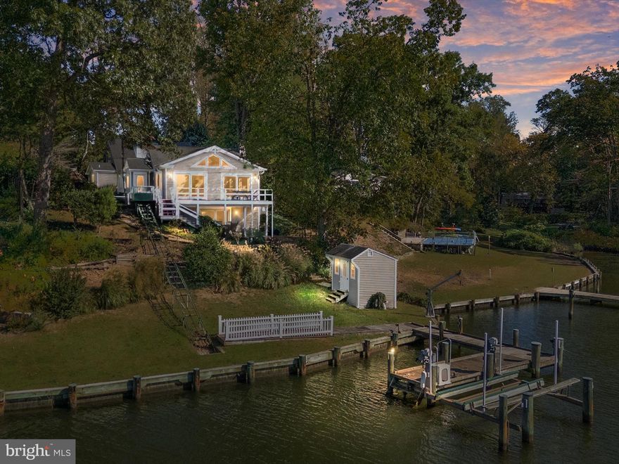Enjoy amazing sunsets over the South River from this waterfront retreat overlooking Spring Lake. This 3-bedroom, 4-bath home is thoughtfully designed for comfort, convenience, and the ultimate waterfront lifestyle. The property features a large deck and a private dock with 4’ MLW, complete with a boat lift, two additional slips, and a boat davit—ideal for boating enthusiasts. A shed with electric service provides storage for all your gear.
Inside, the recently updated kitchen offers granite countertops, stainless steel appliances, and elegant glass-front cabinetry. The spacious primary suite features a luxury bath with heated floors. Practical touches include two sets of washers and dryers, a residential elevator, and an electric tram providing easy access down to the water.
Additional highlights include a paver driveway with parking for 4–6 cars, a whole-house propane generator, warm oil heat with hot water baseboard, plus two heat pumps and a split-zone system for year-round comfort.
Located in a water-privileged community, enjoy access to a boat ramp, community dock with pavilion, and playground—perfect for gatherings and events. Whether you’re relaxing on the deck, entertaining, or spending time on the water, this home offers the best of the South River lifestyle.