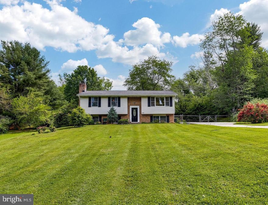 BACK ON THE MARKET!!!  WELCOME HOME!!  This split foyer is set on over 1 acre of land surrounded by nature and beautiful views!  Enter into your new home that has hardwood floors throughout the entire first floor along with three  bedrooms upstairs. The Dining Room boasts a large glass door leading to the deck and backyard where you can enjoy the pool!  The downstairs has a large family room with fireplace and bonus bedroom that can easily  be used as an office.  HVAC and pool deck replaced 4 years ago. Pool liner and Sand Filter 2 replaced years ago.  Do not wait on this one, it will go fast!!