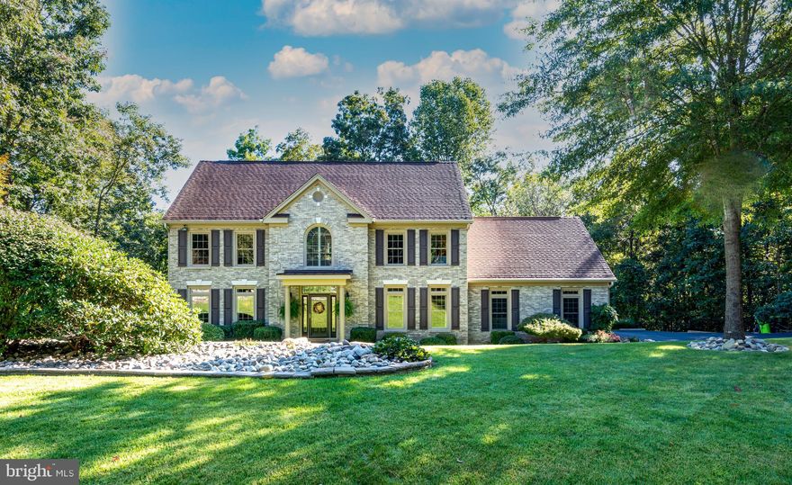 Situated at the End of a Cul de Sac on an Oversized 1.4 Acre Lot in Sought after South Wales Neighborhood. Three Finished Levels with Nearly 3500 Finished Square Feet.  Meticulously Maintained and  Updated Through Out ,  Inviting 2 Story Foyer with Hardwood Floors, Beautifully Renovated Kitchen, Family Room with Gas Fireplace with Doors Leading to an Amazing Covered Deck Area, Upper Level Includes a Large Loft/Flex Area , Luxury Owner's Suite with a Custom Closet & Spa Like Bathroom, 2 Additional Spacious Bedrooms and Guest Bathroom, Full Finished Tiled Basement with 2 Windows and Walk-Out, You'll Love the Stamped Concrete Walkways & Patio Areas, Lush Landscaping and Lawn with Sprinkler System, Partially Fenced Backyard with River Rock Borders, Very Private Lot Backs to Open Space, Immaculate Finished 2 Car Garage with Stairway Leading to Basement.  Too Many Special Features to List!    Must See to Appreciate.