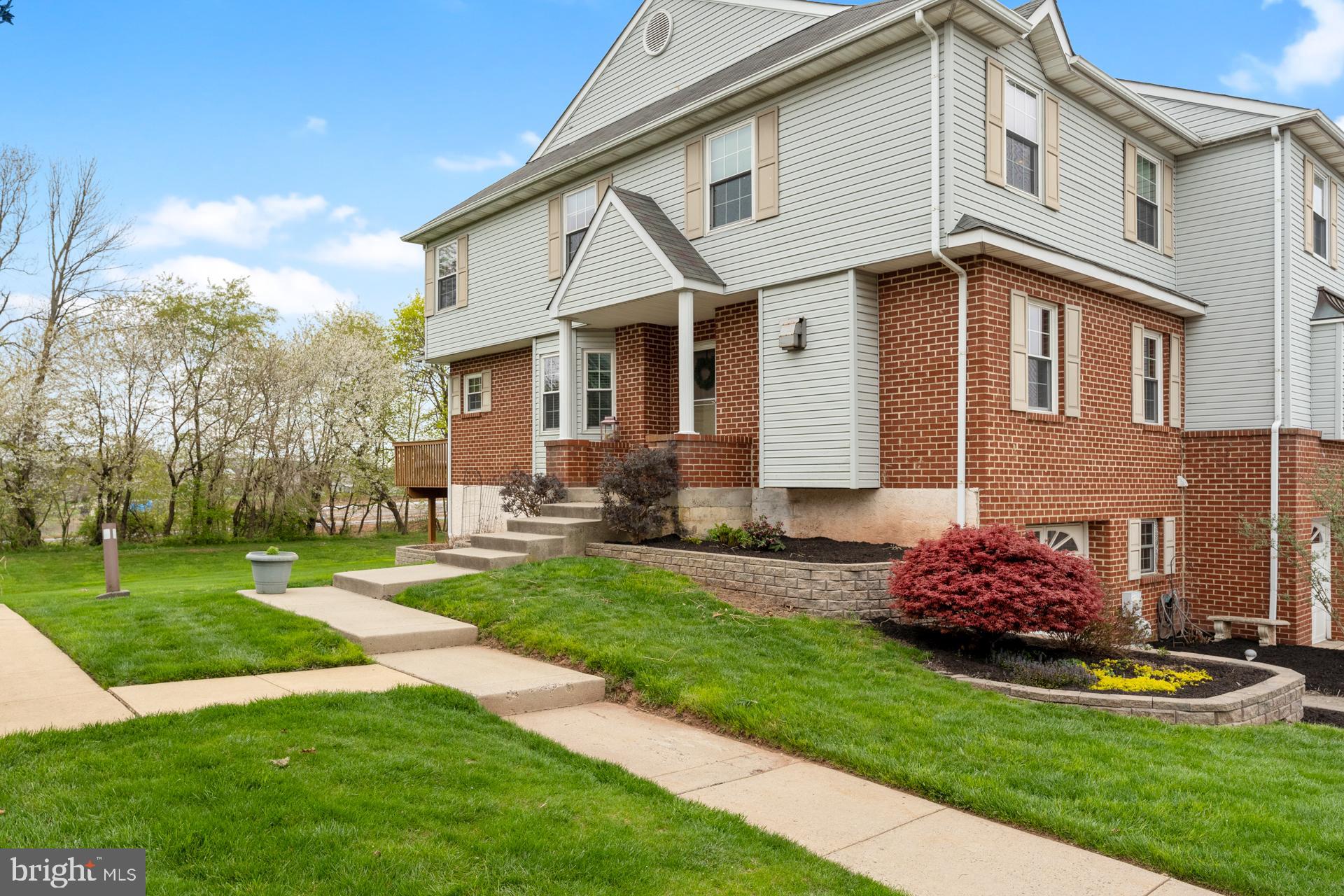 Welcome to 45 Cedar Court. This beautifully renovated end of row townhome is perched in the sought after community of Fox Ridge. Nestled in the heart of Montgomery County, this 3 bedroom 3.5 bath boasting over 2500 square feet of finished living space is a MUST SEE. The home invites you in by means of the spacious living room, complete with a plank wall accent, chair railing, crown molding, and is dressed in well maintained honey hued hardwoods. The floor plan transitions seamlessly to the formal dining room that is bathed in natural light from the bay window feature. Off of this space you will find a fully refinished half bath before you are welcomed to the heart of the home, the custom kitchen. This area of the home is complete with herringbone patterned wide plank flooring, granite countertops, sleek shaker style cabinetry, and stainless steel appliances. An eat-in banquette rounds out this functional space, tucked to the rear of the kitchen. Counter space and storage is abundant in this space. Rounding out the first floor you will find a perfectly situated laundry room. Upstairs you will find the spacious owner's suite complete with fully renovated private ensuite containing a soaking tub, stand alone shower, and vanity. The remaining two bedrooms on this floor are also sizable, sharing the use of a full hall bath. The bonus features and updates of this home do not stop at the two primary floors of living, but extend to the professionally finished lower level. Utilize as an income producing unit or an in-law suite, this sprawling space holds a kitchenette, and a full bath in addition to the living area that holds a private exit to the backyard. Close to many major routes, public transportation, and all of the restaurants, shopping, and commerce that Montco has to offer.