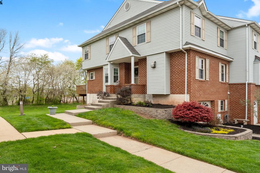 Welcome to 45 Cedar Court. This beautifully renovated end of row townhome is perched in the sought after community of Fox Ridge. Nestled in the heart of Montgomery County, this 3 bedroom 3.5 bath boasting over 2500 square feet of finished living space is a MUST SEE. The home invites you in by means of the spacious living room, complete with a plank wall accent, chair railing, crown molding, and is dressed in well maintained honey hued hardwoods. The floor plan transitions seamlessly to the formal dining room that is bathed in natural light from the bay window feature. Off of this space you will find a fully refinished half bath before you are welcomed to the heart of the home, the custom kitchen. This area of the home is complete with herringbone patterned wide plank flooring, granite countertops, sleek shaker style cabinetry, and stainless steel appliances. An eat-in banquette rounds out this functional space, tucked to the rear of the kitchen. Counter space and storage is abundant in this space. Rounding out the first floor you will find a perfectly situated laundry room. Upstairs you will find the spacious owner's suite complete with fully renovated private ensuite containing a soaking tub, stand alone shower, and vanity. The remaining two bedrooms on this floor are also sizable, sharing the use of a full hall bath. The bonus features and updates of this home do not stop at the two primary floors of living, but extend to the professionally finished lower level. Utilize as an income producing unit or an in-law suite, this sprawling space holds a kitchenette, and a full bath in addition to the living area that holds a private exit to the backyard. Close to many major routes, public transportation, and all of the restaurants, shopping, and commerce that Montco has to offer.