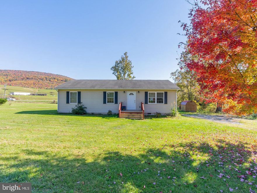 NEW PRICE! Turn key home, ready for you! Enjoy gorgeous mountain views from your back deck! Lovely, well-maintained, one level living with large yard. Part of the yard is fully fenced. Fruit trees, garden, and wet-weather stream enhance the beauty and serenity of this convenient location approximately 2 miles from the VA/WV line in Mathias, WV. Newer floors, paint, washer, dryer, refrigerator. Septic pumped 7/24. Make an appointment today!