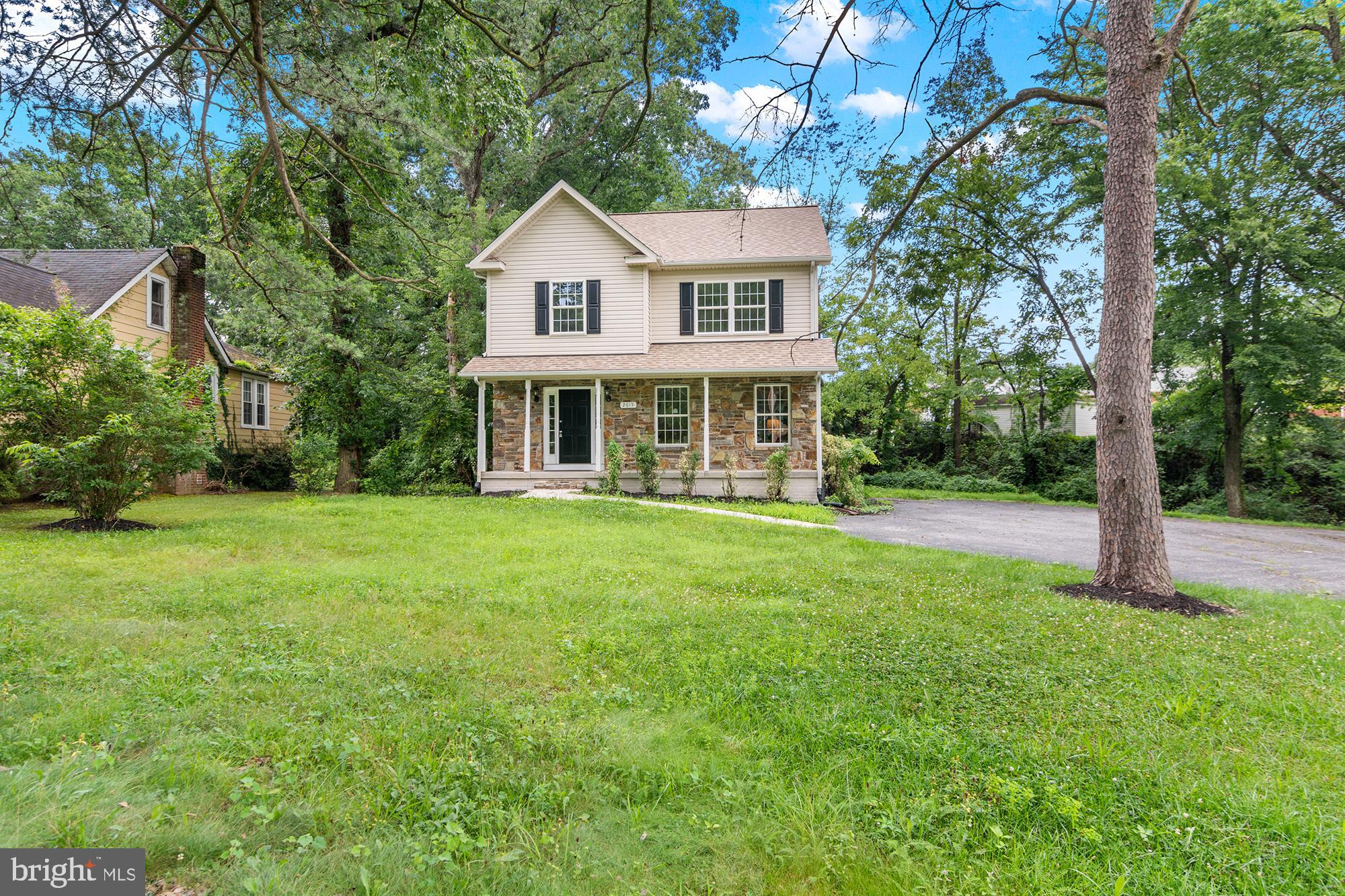 Rarely available Cub Hill location! This custom colonial was stick-built on-site with care and attention to detail! Features beautiful stone masonry accent under the covered front porch. Main level features large foyer with ceramic tile floors, coat closet and half bath. Ceramic floors continue into the large country kitchen with granite counters, solid wood cabinets, pantry, stainless appliances, and door for future deck to exterior. Kitchen is open to the dining area, which also has ceramic floors and bay window. Second floor features large primary bedroom suite with triple bay window, large closet, full bathroom with double vanity and separate tub/shower. Two additional bedrooms and hall bathroom plus laundry area on the second floor! Lower level is ready for your finishing touches into rooms, or use as a studio or workshop. Has extra tall ceiling height. The entire home has been freshly painted and has new carpet throughout. Brand new 30 year architectural roof and new gas water heater. Circular driveway for easy access and plenty of parking. No HOA and no deferred water/sewer charges. Walking distance to fields and open space at Pine Grove Middle School, Krause Park, short walk to Weber's Farm or the Pine Ridge Swim Club! Convenient location in the northernmost section of Parkville!! Zoned for Loch Raven High School.