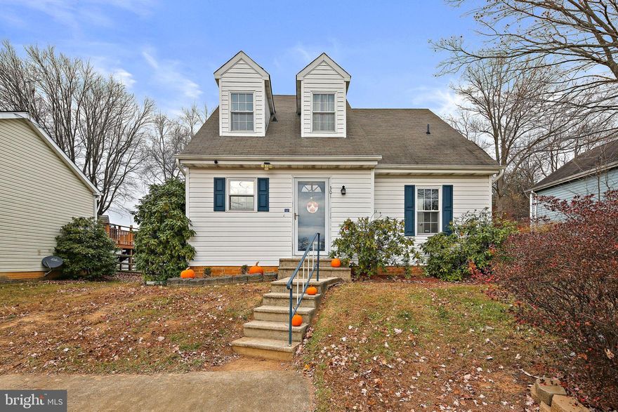 Nestled in the serene Timber Grove community, this exquisite Cape Cod-style residence offers a harmonious blend of elegance and comfort, perfect for those seeking a refined lifestyle. With 1,562 square feet of thoughtfully designed living space, this home is a sanctuary of tranquility and sophistication. Step inside to discover an inviting open floor plan that seamlessly integrates the dining and living areas, creating an ideal space for entertaining or quiet evenings at home. The entry-level bedroom provides convenience and flexibility, while the tasteful window treatments enhance the ambiance, allowing natural light to flood the interior. Plush carpeting underfoot adds warmth and comfort, making every step a pleasure. The heart of the home is the well-appointed kitchen, featuring high-quality appliances including an electric oven/range, refrigerator, dishwasher, and washer/dryer. Whether you're preparing a gourmet meal or enjoying a casual breakfast, this kitchen is designed for both functionality and style. Venture outside to experience the exterior features that elevate this property. A charming deck invites you to bask in the beauty of the scenic vista that surrounds you, providing the perfect backdrop for outdoor gatherings or peaceful moments of reflection. The property also includes an outbuilding and a shed, offering ample storage solutions for your hobbies and outdoor equipment. The full, heated basement is a remarkable bonus, providing additional space that can be tailored to your needs-whether it's a home gym, workshop, or extra storage. With windows that invite light and a sump pump for peace of mind, this area is both functional and versatile. Parking is a breeze with off-street and driveway spaces accommodating up to two vehicles, ensuring convenience for you and your guests. This property is not just a home; it's a lifestyle. Enjoy the tranquility of Timber Grove while being just moments away from local amenities and recreational opportunities. Experience the luxury of a well-crafted residence that embodies both comfort and elegance, making it the perfect retreat for those who appreciate the finer things in life. Don't miss the opportunity to make this exceptional property your own.