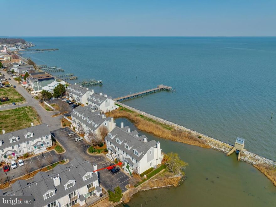 * LIVE THE SALT LIFE YEAR-ROUND — or make this your perfect Vacation Home! Rare opportunity to own in this highly desirable Chesapeake Bay Community with exceptional walkability and stunning water views.      

This beautiful water-view townhome offers spectacular Bay Views and a thoughtfully designed layout where EACH of the 3 Bedrooms feature its own private en-suite bathrooms.   2 of them  with dual Quartz vanities and the 3rd with a single Quartz vanity.   Powder room also has a singe Quartz vanity.    Two bedrooms showcase gorgeous Coastal Chesapeake Bay views, while the versatile third level can serve as a third bedroom, studio, office, or flex space, also - with a Spectacular Bay View.

The home also features  a bright and inviting kitchen with Quartzite counters and Gas Stove, separate dining area, recessed lighting and Real Hardwood Floors throughout the home. Cozy up by the propane fireplace with Marble surround or take a short stroll to the private SeaGate community fishing pier.  Home has been tastefully Renovated/Updated with love 2021-2025.   **See documents section for the FULL LIST of UPDATES & UPGRADES**

  Enjoy everything the Twin Beaches lifestyle offers — Amazing Restaurants,  Public Beaches, Marinas, Fishing Piers, Multiple Boardwalks, and the Rod 'N' Reel Resort with Spa and Gaming.   Experience the charm and coastal lifestyle of Chesapeake  and North Beach.   Easy commute to Washington, DC, Annapolis,  Baltimore, and Joint Base Andrews.