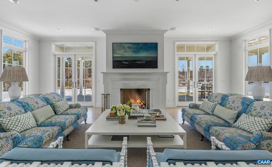 Setting a new standard in Albemarle County, this just-completed, bespoke residence on 4 acres enjoys 180' vistas in the Keswick Estate neighborhood. Upon entering the expansive front hall, one is struck by the sparkling water views; light reflecting off Broadmoor Lake floods most rooms. The floor plan & finish details offer endless inspiration, incl' 10ft ceilings, white oak floors, extraordinary millwork + stone, light fixture & hardware selections. Accessed via covered walkway, the 3 car garage w/ golf cart bay provides expansion potential w/ walk-up 2nd fl. One for the books, the 1st fl bath & dressing room incl' steam shower, stunning tub overlooking the views & large closet w/ beautiful island. Located adjacent to formal dining & a stunning butler?s pantry there is a wine aficionado?s dream display & storage room. 3 bedroom suites & laundry on the 2nd fl & the 3rd fl incl' a large room w/ built-in bunks & full bath, ideal for sleepovers & family visits. In the basement are gym, family/rec rooms, storage. Keswick Estate is w/in mins of Charlottesville & offers private club amenities + world class dining a leisurely stroll or speedy cart ride away.,Marble Counter,Exterior Fireplace,Fireplace in Family Room,Fireplace in Master Bedroom