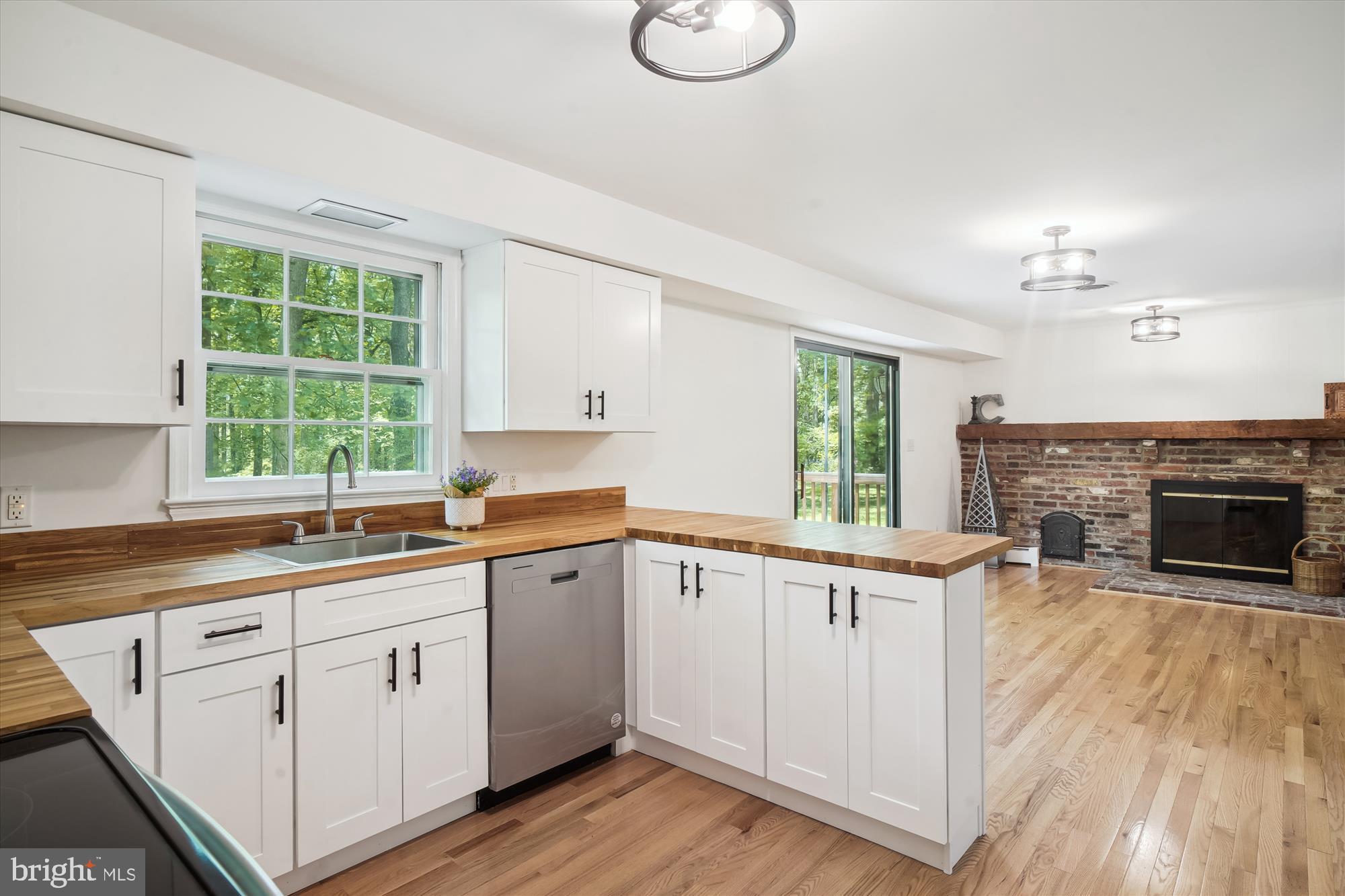 Open house Sunday, June 25th, 1-3.Welcome home to this newly remodeled 5 bedroom 2.5 bath located on a 2 acre park like setting. Gleaming hardwood floors adorn both the main and upper levels. The formal dining and living room, both with bay windows to let in the natural light, have a natural flow that is perfect for entertaining. The kitchen has new cabinetry, butcher block countertops and stainless steel appliances. The cozy family room off of the kitchen has a beautiful wood burning fireplace and access to the deck and private backyard. Completing the main level is a half bath, large laundry room with new washer and dryer, and a two car garage. The upper level has 5 generously sized bedrooms with ample closet space, hall bath and access to the attic. The primary bedroom with its ensuite bathroom has access to the room next door which could be used as a sitting room or home office. The lower level has plenty of storage space or it could be finished for more living space. An additional storage area houses the brand new boiler. Convenient to Olney shopping, restaurants, Brighton Dam.