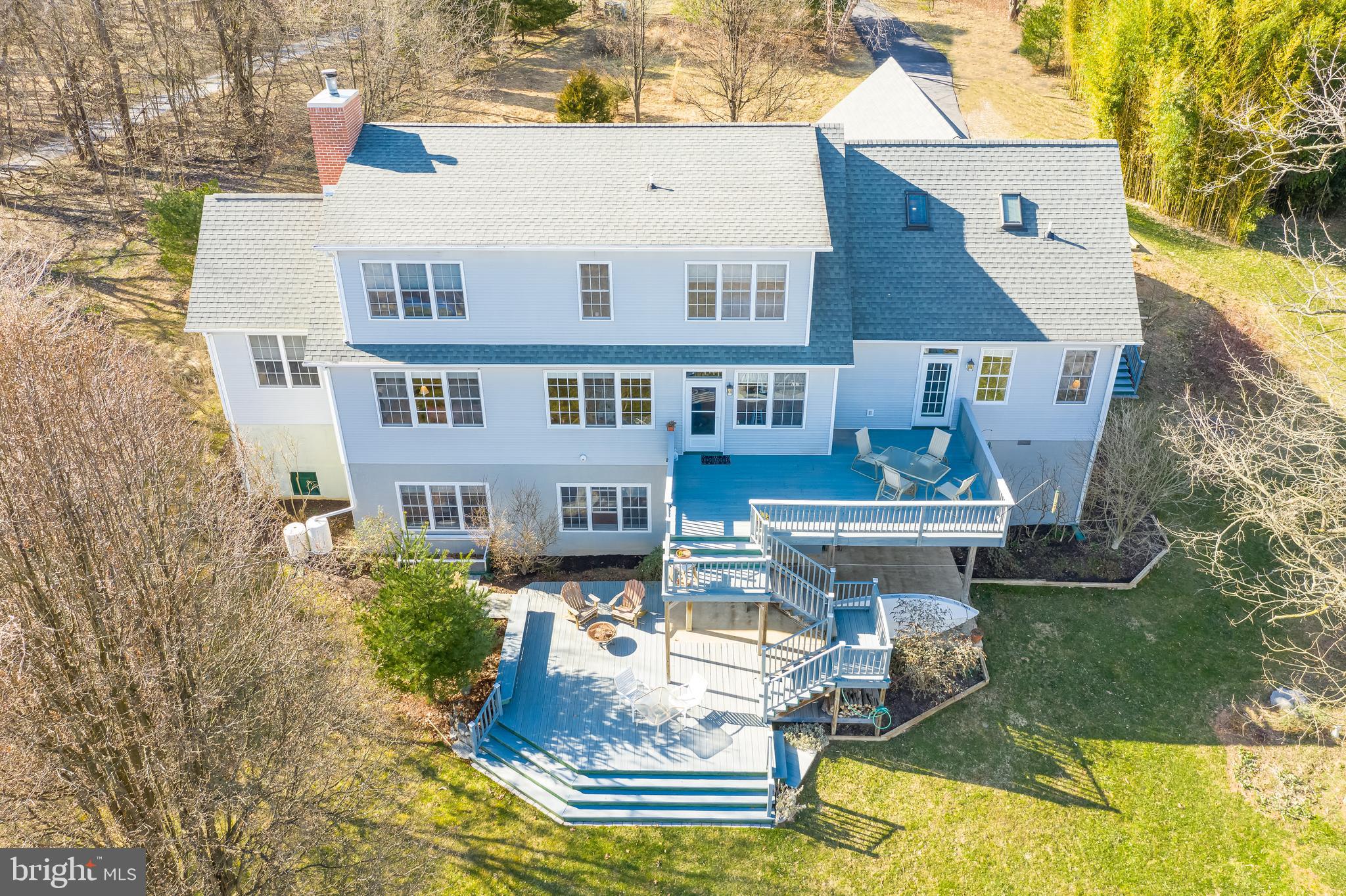 Beautifully nestled on a peaceful, private 3 acre landscaped property only 7 minutes from Shepherdstown, this 3 story elegantly designed open floor plan home opens to a large custom built two level deck, w plenty of back patio space for relaxing or entertaining. Offering incredible views of surrounding hills and countryside.Spacious Master Bedroom/Bath and Laundry on main level. High Quality upgraded gas stove in well designed kitchen w a convenient butler s pantry. Enjoy hardwood & tile floors throughout home, plus new carpet in Master Bedroom and Study. Upper level Bonus room enjoys extra light through custom installedskylights. Freshly painted interiors and newly stained deck. Partially finished full walkout Basement with full bath and kitchenette, create a wonderful additional play, relax or retreat space w separate Basement shop area, including custom built workbench. Insulation newly installed over the oversized 2 car attached garage.**Energy efficient Modulating Units help utilize the most efficient choice (propane or electricity) needed at any time w 5 fan speeds and zoned systems, resulting in much lower monthly utility costs.Native trees and landscaping surround home. Graceful fully paved driveway from main road. This is truly an oasis only minutes from fine dining, Shepherd University s cultural and academic opportunities, hiking trails, river recreation, shopping and world renowned nearby historic sites & towns. A MUST SEE!