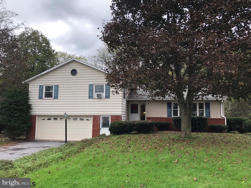 AFFORDABLE HOUSING ALERT! Looking for ROOM TO ROAM? Check out this 4/2.5 ONE OWNER split level home on OVERSIZED FLAT lot backing up to wooded acreage of Cold Stream just steps away from Philipsburg H.S. in the quiet Philips Heights neighborhood w limited traffic. Enjoy the wildlife in the backyard along w a 2 car garage and shed. Recently painted throughout, the eat-in-kitchen w ceramic tile and backsplash and cozy family room with gas fireplace will make holiday gatherings special. 24hr notice requested for showings.