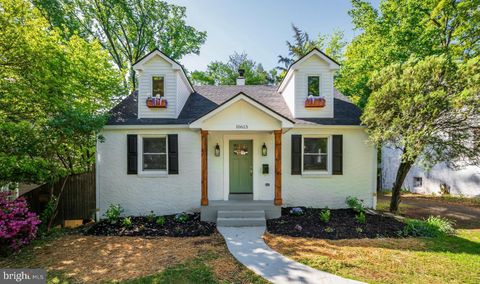 Photo of 10613 S Dunmoor Drive S, SILVER SPRING, MD 20901 (MLS # MDMC2230764)