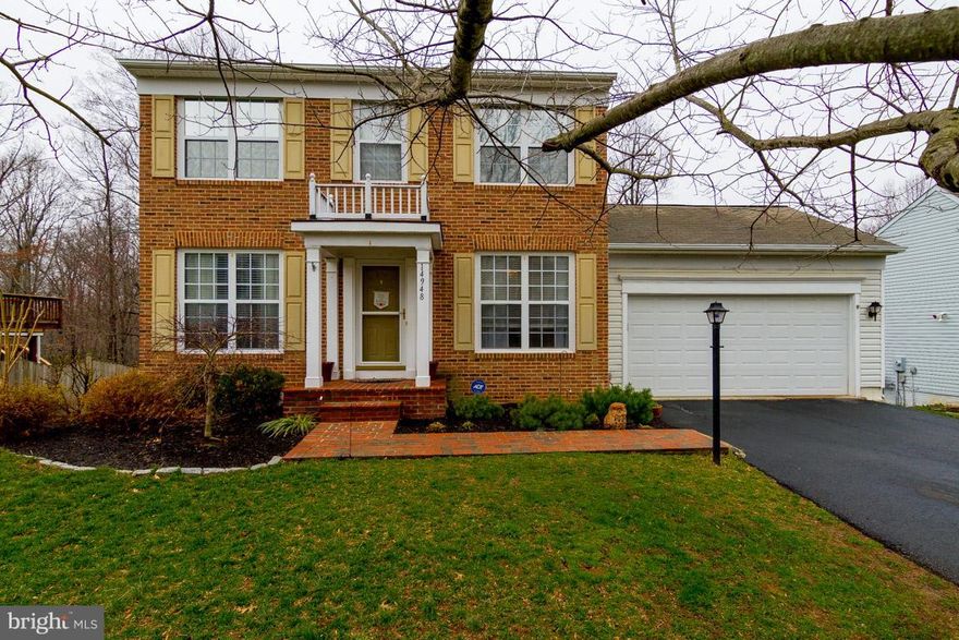 Charming 4 bed 3.5 bath Colonial in sought after Winding Creek Estates. Kitchen features updated stainless steel appliances, corian counters, hardwood floors, double sink, and lots of storage space. Master bath features double vanity, jetted tub, separate shower and walk-in closet. 4th bedroom in walk-out basement. Fully fenced back yard with 2 level deck backs to wooded area for privacy. So nice!