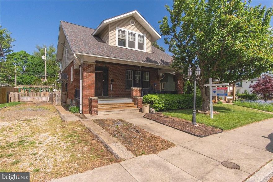 SO YOU'RE SAYING THERE'S A CHANCE!!!!!       Back on Market (buyer lost job can't get loan) CLASSIC HOME with all the character you desire!  Looks at those floors and trim!  Very spacious rooms, larger than normal closets for a home from this era, well maintained throughout.   MAIN LEVEL BEDROOM and full bath, as well as 2 additional bedrooms and full bath on top level.   Basement is "unfinished" but provides a ton of storage space in addition to the laundry area and extra rooms for whatever you need.  Did I mention this has a NEW ROOF!   Outside you do have a private driveway for off street parking as well as alley access to the double garage - 2 cars and more storage!   Fenced Yard, sitting areas, and planting areas as well.   Talk about convenient to shopping....just a few blocks to Longmeadow shopping center/you could easily walk to morning coffee, restaurants, shopping etc.   Check it out - you will love it!