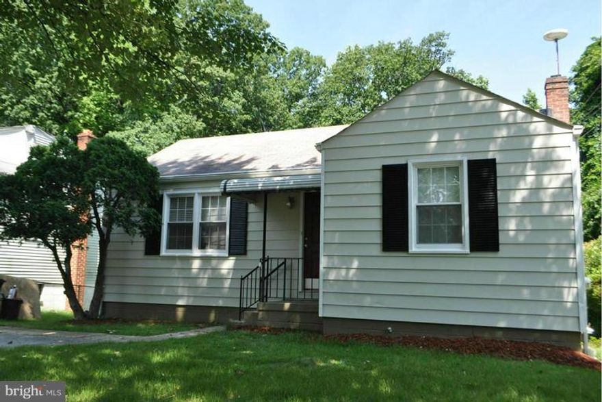 Remodeled, this home has granite countertops, hardwood flooring and freshly painted. Easy commute to DC., Military Bases. Lower level has carpeted family room with built in shelving, two bedrooms, laundry with full size washer and dryer and a full bath. Main level has living room, kitchen/dining combo and two additional bedrooms with a full bath.