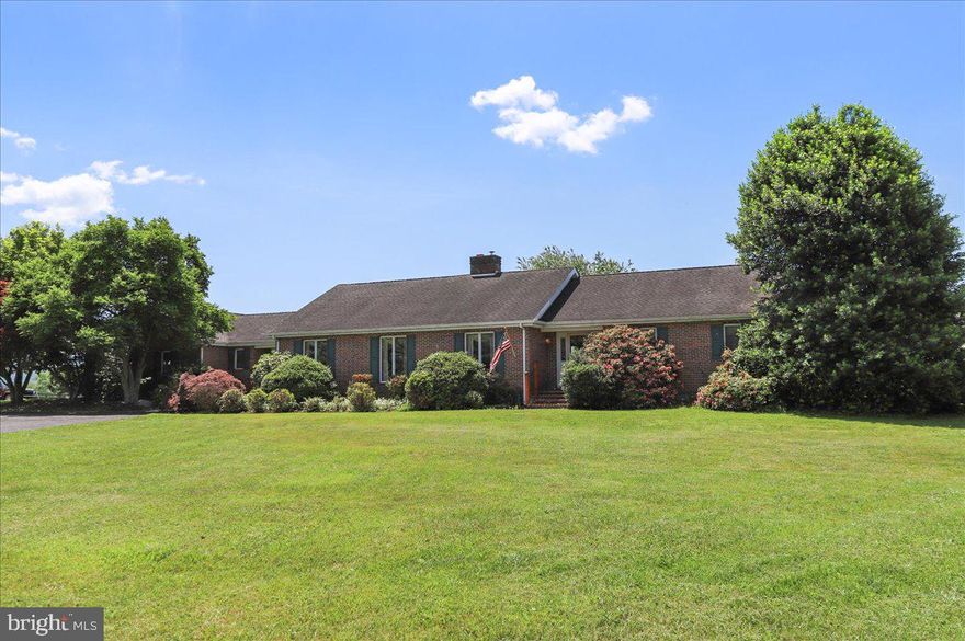 Don't miss out on the opportunity to own this meticulously maintained three bedroom, three and a half bath rambler on 2 acres with amazing mountain views, large bedrooms, and in-ground pool. Accessibility abounds with a ramp from the garage to the kitchen, wide doors and halls and even a ramp into the pool! With all of the bedrooms on the main level, the spacious rooms flow throughout the very useable floor plan. The centrally located kitchen offers dining in the breakfast area and vaulted ceilings to provide an even more open feel. A cook's delight with double wall ovens, gas cooktop and brand new microwave. There is ample natural light throughout which shines through the Anderson windows surrounded with beautiful wood trim. The family room features a gorgeous floor to ceiling stone fireplace with a pellet stove to keep you warm on the coldest of days. There is also a separate, large dining room perfect for entertaining large groups.  Adjacent to the primary bedroom is a large home office/flex room complete with hot tub and full bathroom. The in-ground pool creates a private oasis perfect for relaxing and entertaining while enjoying the beautiful mountain views beyond. The pool also features a ramp entry, new z sand filter and a custom winter cover. The pool equipment is housed in an enclosed space which also doubles as a large workshop equipped with built-in benches. Generous storage space can be found in the basement as well as a Culligan reverse osmosis water purification system. The kitchen, dinette, dining room and living room all have adjustable recess lighting in the ceiling. The extra wide garage has space for two cars as well as additional space to the side for storage and even a workshop. No detail has been spared! Call today for a private tour.