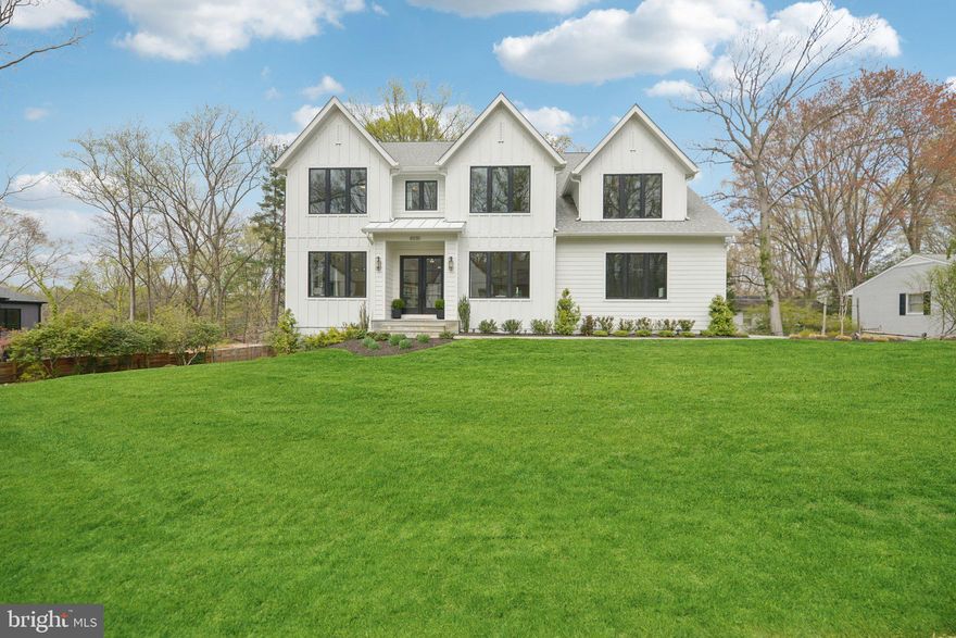 Welcome to 6030 Woodland Terrace, a masterpiece of modern elegance nestled on one of McLean's most picturesque streets. This magnificent 2-year-old residence seamlessly blends luxury with function, offering 7 bedrooms and 7.5 bathrooms across a generous 6,748 square feet of living space.

The home invites you in with its open, spacious floor plan filled with natural light, highlighting exquisite designer touches throughout. The expansive owner's suite is a serene retreat featuring two large walk-in closets and a large en suite bath. Entertain with ease in the walk-out basement, complete with a fitness room for your active lifestyle.

Step outside to your backyard dream oasis, complete with a built-in hot tub, fire pit, and barbeque area nestled on a large flagstone patio—perfect for hosting gatherings or enjoying peaceful evenings. Situated on an expansive .41 lot, this property offers ample space for both relaxation and recreation. Discover the perfect blend of luxury and comfort in this extraordinary McLean home.