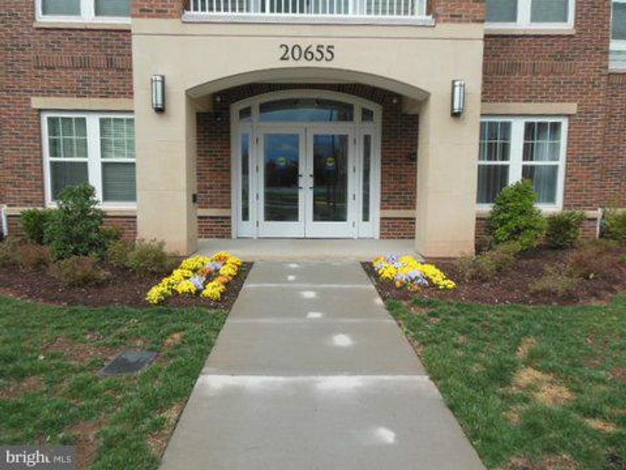 REDUCED $18,000 in Potomac Green over 55 community.2 large bedrooms with full baths,sep dining room,kitchen with nook and laundry close by.Lg.great room with balcony.Only 1 1/2 years old with builders warranty left. Has a one car garage with parking behind it (valued at $15,000). V.A. assumable loan at 3.25%,balance on the loan $319,000 by VA buyer.Owner anxious,must move now.  Fabulous community