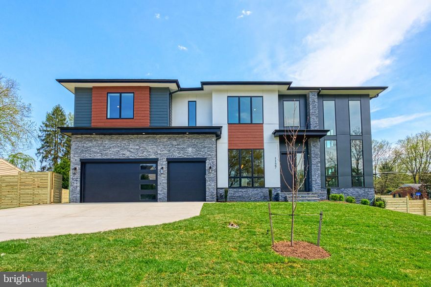 Builder is offering a $5,000 closing cost credit, plus an additional lender discount of 0.50% of the loan amount when using builder's preferred lender and title company. Introducing 1127 Guilford Ct, a prestigious and opulent 7-bedroom residence situated in the coveted locale of McLean. Set within the esteemed West Langley neighborhood, this residence seamlessly combines sophistication with convenience, offering a lifestyle enriched by natural beauty, cultural richness, and proximity to essential amenities. Boasting over 7,900 sq. ft. of living space across three levels, this residence provides a sanctuary of indulgence and entertainment. The gourmet kitchen, adorned with high-end appliances, quartz countertops, and elegant maple cabinets, beckons culinary enthusiasts. An Deck and an covered porch extend the living space outdoors, perfect for alfresco dining and relaxation. This residence also offers the option of an elevator, providing accessibility and convenience for all residents.

Crafted by Anchor Homes, this French Country style abode exudes luxury at every turn. The primary suite indulges with a palatial closet, a decadent freestanding tub, dual vanities, and the possibility of an additional wet bar. The fully finished basement is a haven of leisure, featuring a media room, wet bar, and a sprawling recreation area finished with Luxury Vinyl Flooring. Each bedroom is appointed with its own walk-in closet, ensuring ample storage solutions for residents.

Benefiting from a 0.34-acre lot, this residence enjoys proximity to renowned educational institutions, including Franklin Sherman Elementary, Cooper Middle School, and Langley High School, making it an optimal choice for families seeking top-tier schooling. Please feel free to contact us for further details. Seize the chance to make 1127 Guilford Ct your distinguished address in McLean.