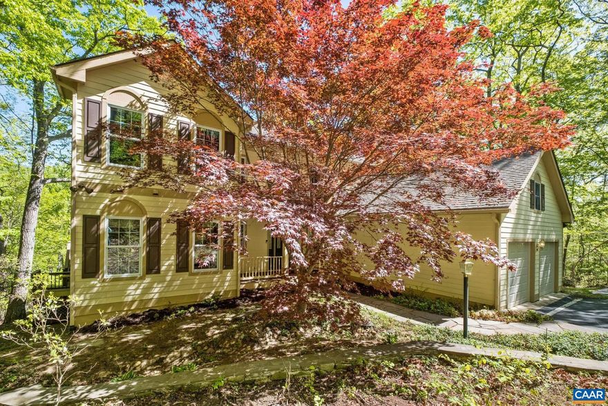 High in the foothills in Stoney Creek on 3.5 naturally landscaped acres this charming mountain home offers you cool summer breezes, stunning winter views, gorgeous rock outcroppings, and trails to Pauls Creek out your back door, all while enjoying,  golf, tennis, swimming, pickleball, Lake Monocan, biking and dining right in your Stoney Creek community.With over 4100 sq ft on 3 levels this lovely home is ideal for year round living, second home or rental property. From the moment you enter you are ready to relax in the light filled great room with floor to cathedral ceiling glass looking out into Japanese maples in spring and summer and mountain ridges with turning leaves in fall and views in winter. The open kitchen and dining makes cooking or entertaining a dream and spills out to the screened porch and lage deck where you can near the lovely sound of Pauls Creek. The spacious primary suite on the main floor makes it perfect for year round living. Upstairs is loft den, second bedroom and bath. Downstairs is a large faimly room, second kitchen, game area, 2 BRs and bath, bonus room for office/exercise or sleeping a 2nd deck and beautiful stone patio with steps to the trail. All of this waiting for you in idyllic Nelson County!,Tile Counter,Wood Cabinets