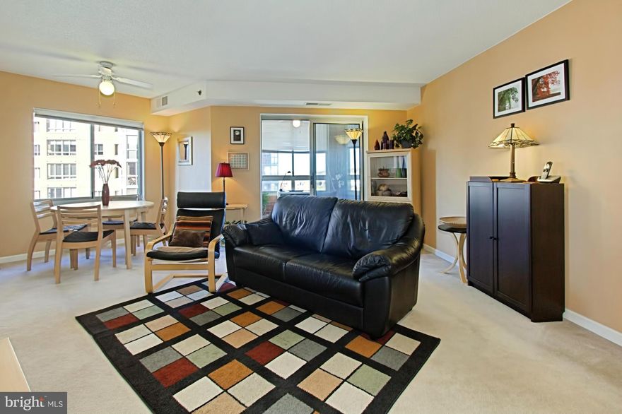 1 BR, 1 BA has DR area, kit table area, W/D & encl balcony (not incl in 728 sqft), which creates a bright, light, warm home. Great layout with large windows in every room. Located in the 'South' building w/24hr staffed desk. Incl 1 garage & storage. Enjoy Carlyle's amenities: pool, 2 gyms, tennis, putting green, 24-hr security, etc. Just blocks to metro, PTO,shops,movies,restaurants & Whole Foods