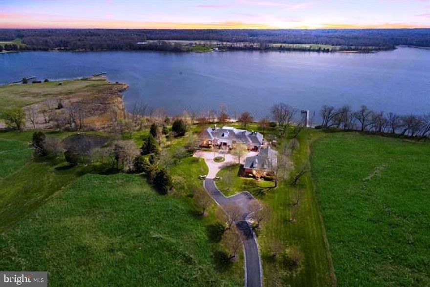 This custom estate known as Hunters Rest consists of 22 waterfront acres and is one of the most beautiful properties in all of Southern Maryland.  This  8000 plus square foot home was custom built to the highest standards available and thoughtfully crafted.  The home  was designed for entertaining and offers a large gourmet kitchen with granite, stainless, two islands and so much more.  Stunning water views every where you look. The master bedroom is located on the main level with large custom closets and luxurious bathroom. Main level living with three extra rooms downstairs. Five fireplaces, two laundry rooms, movie room upstairs with built in King size Murphy bed.  Phantom executive screen system on large brick porch is ideal for entertaining. Efficient Geo-thermal heating and cooing systems to all custom mill work, you will be impressed.   Private deep-water pier, 720 feet of waterfront, your own barn  and a three car garage are just some of the other amenities this home offers.   Potential for a waterfront pool. If you have to telecommute, this is the place to be!