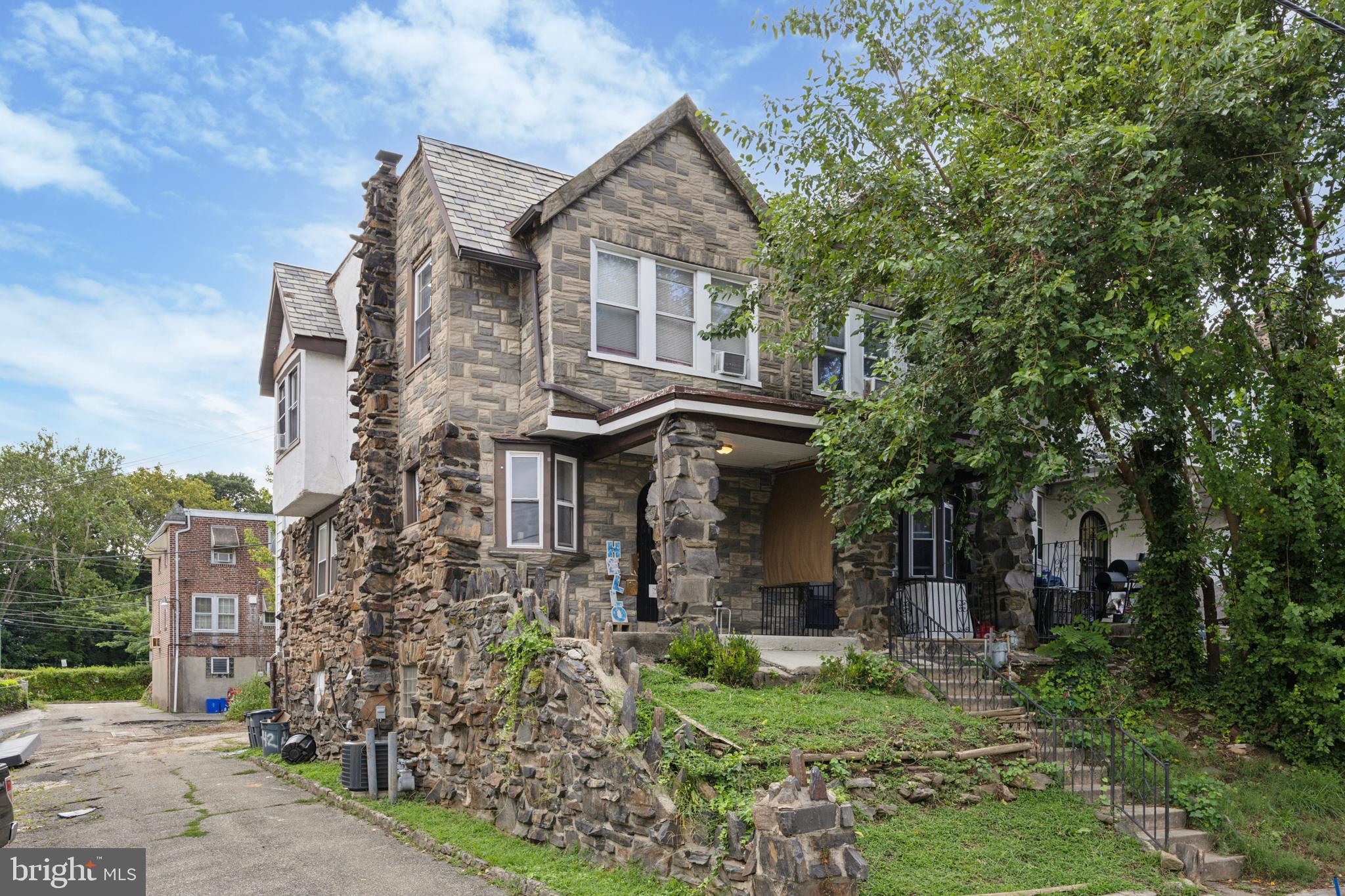 End-of-row gem within walking distance of shopping, dining, transit, schools & community college. Recent interior & exterior updates, easy-care front yard, and plenty of parking. Inside, you're greeted with a local artist’s LOVE mural, hardwood floors, and open concept kitchen that creates instant charm! Upstairs: 3 spacious, bright bedrooms & full bath, waiting for you to add your personal touches. New appliances, serviced central air. Finished and waterproofed lower level equipped with bedroom, bath, laundry & second entrance that faces the rear of the property.