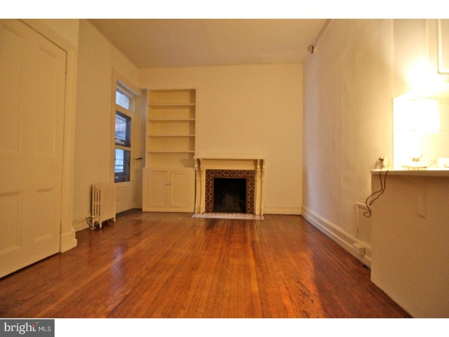 Available May 1st: This apartment has hardwood floors throughout, built in shelving, and true Rittenhouse Square character! The bedroom over-looks Spruce street and receives tons of natural light. Heat is included in the rent, tenants are responsible for electricity and cooking gas. Coin op laundry is available for tenants in the basement of the building. Directly around the corner from Rittenhouse Square, this unit is surrounded by world renown restaurants, cafe's, pubs and eateries. There are truly too many to name. Just steps to groceries. This location is the epitome of convenience for walkers, bikers, and commuters. Receiving a walk score of 98, transit score of 100, and riders score of 99. Great for UPenn and Wharton, young professionals, or anyone that wants to live in an awesome location!! Owner is responsible for heat and water, tenant pays electricity and cooking gas. First months rent and two months security are required for move in.  LEASE TERMS Owner pays water and heat. Tenants are responsible for electric and cooking gas.
