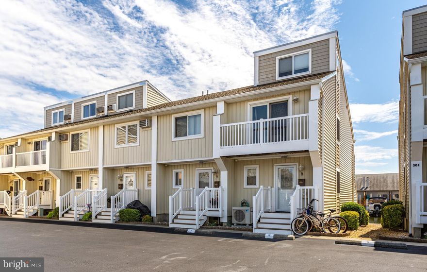 Come and relax, play and enjoy this beautiful waterfront end of group Townhome, in sought after Crab Cove! Completely and very tastefully remodeled 3-bedroom 2.5 bath with private deck and deeded boat slip.  Upgrades includes   heating and air mini split systems, upgraded flooring throughout, deck awing with remote controlled lighting and wind Sensors, Oak Stairs, plenty of storage, 8000lb boat lift, Upgraded Sliding glass doors, New front door internet lock, New Refrigerator, New deck furniture, plus much, much more. This is Truley a must see and will not last long.  Close distance to shopping, restaurants and beach.