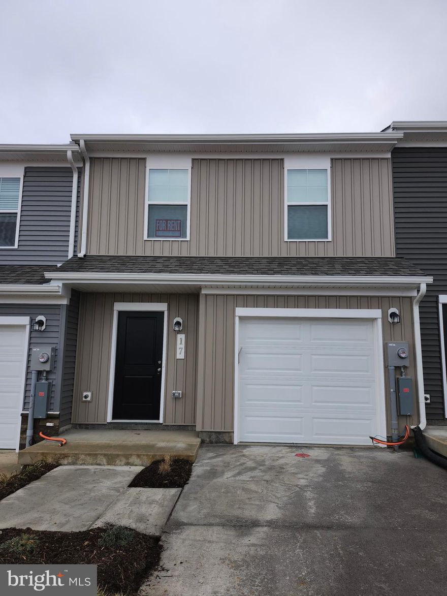 Move-in ready! Featuring ceiling fans, blinds, and a brand-new Samsung smart washer and dryer in the upstairs laundry room. This unique two-floor living design is available exclusively in Charlestown. Perfectly located in the first community you'll reach from Northern Virginia—be the first to call it home!

Enhance your lifestyle at The Rutledge at Essence at Stone Spring, a delightful 3-bedroom, 2.5-bathroom townhouse that perfectly blends modern amenities with traditional aesthetics. Step inside to a welcoming family room on the main level, ideal for relaxing or entertaining. The open-concept kitchen and dining area make it easy to cook and converse simultaneously.

Upstairs, the primary bedroom includes an ensuite bathroom for daily indulgence, and two additional bedrooms provide ample space for family or guests, supported by another full bathroom.

Located just steps from Potomac Marketplace, you'll enjoy easy access to shopping and dining with stores like Weis, Kohls, and Home Depot, and eateries such as Panera Bread and Chick-fil-A. Outdoor enthusiasts will appreciate the proximity to Jefferson County Memorial Park, the Potomac and Shenandoah River Parks, and the Appalachian Trail. Adventure is never far with Harpers Ferry and Charles Town's Hollywood Casino close by, plus Virginia's renowned wineries and breweries just a drive away.

Commuting is effortless with routes like Route 9, Route 340, I-81, I-15, and Route 7 to Leesburg, and convenient MARC Train access at Duffields and Harpers Ferry.

Enjoy upcoming on-site amenities, including a playground, a shared green space with a dog park, and a scenic trail leading to Stream Valley Park.

Touring and Rental Details:

Tours available: Schedule a visit by appointment.
Rental Requirements:
Credit Score: Minimum of 650.
Income Requirement: Must have a gross income of at least 2.5 times the rent.
Security Deposit: Equivalent to one month's rent.



Minimum 12 months lease.