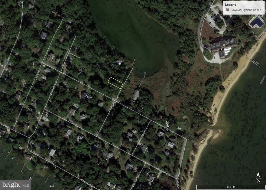 Amazing opportunity to build your dream home on a cleared water view lot in historic Highland Beach ! Quiet, wooded neighborhood just a 12 minute drive to Downtown Annapolis with a community beach steps to the bay. Sewer avail at the street. Plat and survey in docs.