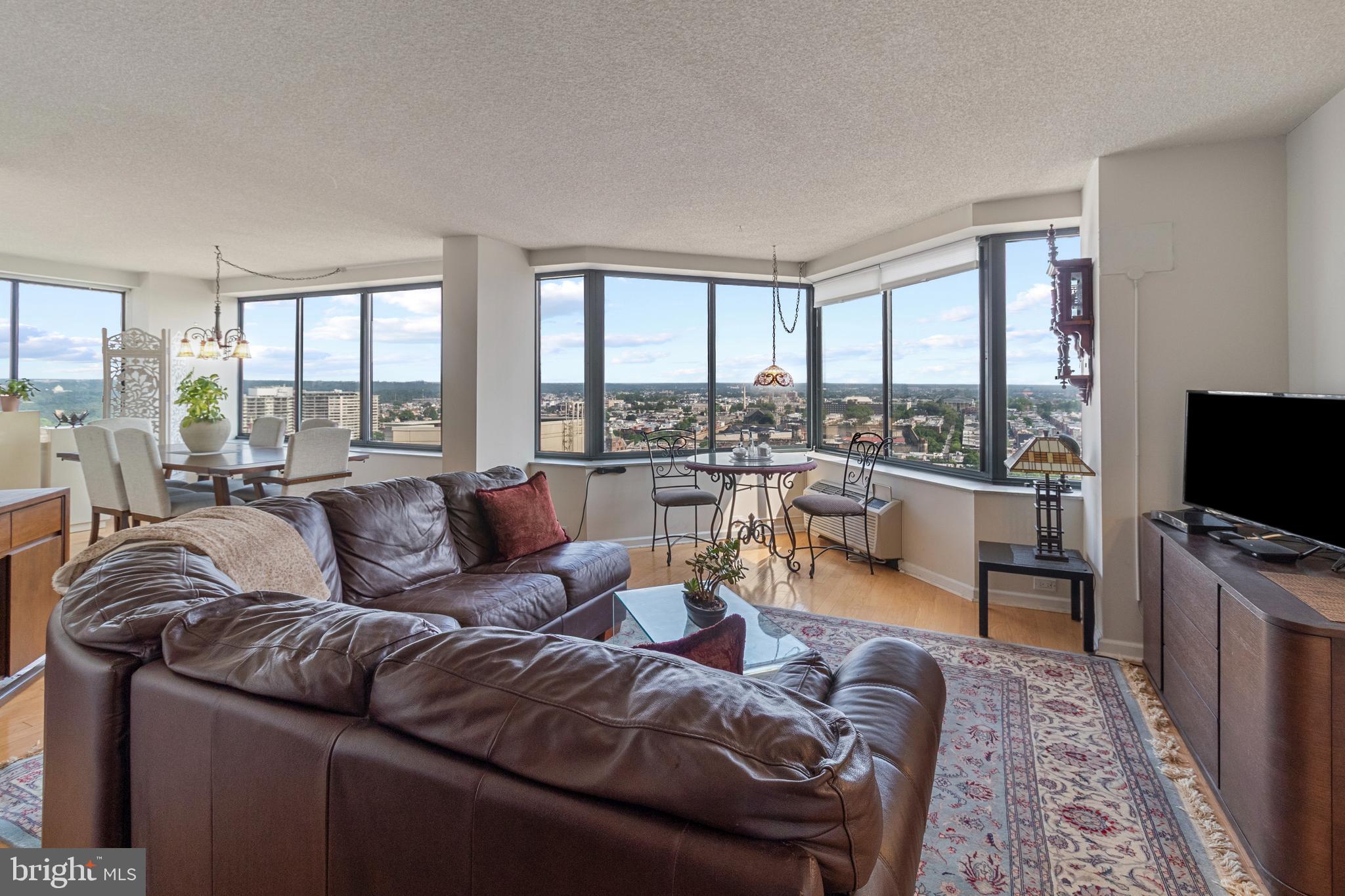 Wow, wow, wow! An incredible opportunity to live in the coveted Cityview PENTHOUSE has arrived! From the moment you walk in, you’ll fall in love with the breathtaking views that surround this spectacular corner condo.
This highly sought-after floor plan offers a spacious 1-bedroom plus den layout (the den can easily be used as a second bedroom) and two FULL renovated bathrooms. Plus, it comes with a covered parking space – a true luxury in the city!
Get ready to entertain in your kitchen featuring granite countertops, stainless steel appliances, beautiful cabinetry, and a breakfast bar. Natural light pours in through the wall-to-wall windows of this north and west-facing unit, highlighting its open floor plan with generous space for both living and dining areas.
The primary bedroom offers ample closet space and a beautifully updated en-suite bathroom.
Cityview’s prime location in the thriving Art Museum area puts you right in the heart of it all – arts, culture, dining, parks, and bike trails are just steps away. Enjoy the outstanding amenities including a fitness center, outdoor green space, swimming pool, bike storage, guest suites, doorman services, and more!
Don’t miss your chance to call this penthouse gem your new home – schedule your private showing today!