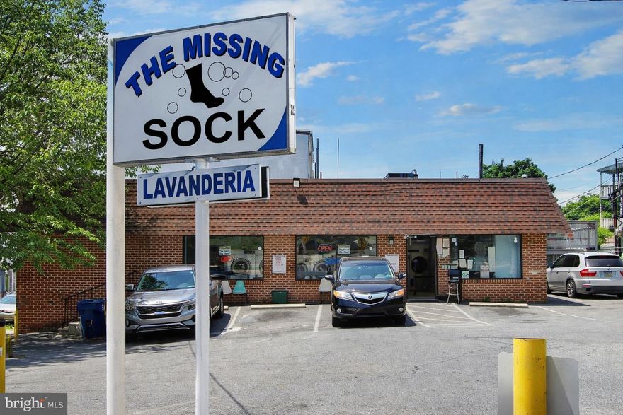 Prime opportunity to acquire The Missing Sock Laundromat, an established and operating laundry facility located at 1170 Perkiomen Ave in Reading, PA.  Positioned along a well-traveled corridor with strong visibility and signage, this location benefits from steady drive-by  exposure and convenient customer access.  The property features ample on-site parking, a significant competitive advantage in an urban market. Customers enjoy easy pull in access an dedicated parking directly in front of the facility, enhancing convenience and repeat business.  The laundromat is fully operational with equipment in place and an existing customer base.  The layout is designed for  efficient customer flow, clear sight lines and functionality.  Large front facing windows provide natural light and storefront visibility, while prominent exterior signage strengthens brand recognition.  Located in a dense residential area with a strong renter population, the business serves consistent neighborhood demand.  this offering is well-suited for an owner-operator seeking immediate cash flow or an investor looking to expand and existing laundry portfolio. There is opportunity for continued revenue growth through operational efficiencies, pricing adjustments, equipment modernization, wash and fold service expansion, delivery partnerships or extended hours (buyer to verify). Financial information, equipment details and operating metrics available upon request.