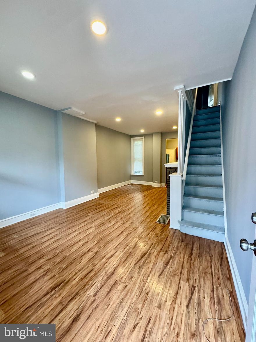 Welcome to 2935 N Bambrey St, a beautifully updated 3-bedroom, 1-bathroom home available for immediate move-in. This property features modern upgrades throughout, including recessed lighting, hardwood floors, a fully renovated kitchen, and an upgraded bathroom. Enjoy the comfort of central heating and the convenience of in-unit laundry with a washer and dryer provided. A refrigerator and stove are also included, making your move seamless. Pets are warmly welcomed, making this the perfect place to call home.