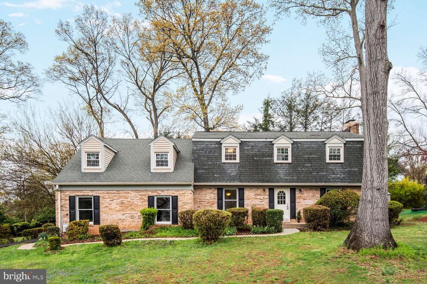 Welcome to this spacious 5 bedroom, 3.5 bathroom home. Generous spaces and circular flow make this a truly livable home. Hardwood floors create a warm environment throughout the first and second floors. The lower level is newly updated with LVT and all new bathroom fixtures. The large space makes for a great recreation area . On the main level a large living room with a fireplace and windows on 3 sides awaits you. For more casual gatherings enjoy the family room with its own fireplace and pastoral views into the backyard. Your new kitchen is right off the family room with space for a breakfast table. From the kitchen and family room go through the slider to a patio where you can entertain on beautiful spring days or host guests in the ample dining room just off the kitchen.  The new vanity and mirror invite your guests into the discreetly located powder room. On the second floor you will find a large primary suite with sitting area , 2 walk-in closets and recently updated en-suite bathroom. Four other generous bedrooms round out this level with a comfortably updated and centrally located hall bath.  Entry from the 2 car garage into the family room and kitchen makes coming home on rainy/snowy days pleasant and tidy.  Additional parking is available in the driveway. Wonderfully located, convenient to 270 and abundant shopping. Offered just in time to enjoy the welcoming Spring and lush Summer in your new home.