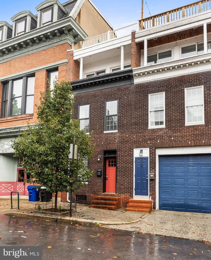 Absolutely remarkable! This recently improved townhome is not only located in the heart of vibrant, active and artistic  Upper Fells Point, but IT HAS 2-CAR SECURE PARKING!  Plus a sprawling roof deck, gorgeous and sleek new baths, Primary Bedroom with private balcony and all 3 substantially-sized bedrooms and all 2.5 baths are above-grade! The main level floor plan is open, light and bright with fantastic lighting while the lower level is available to accommodate all of your storage or workshopping needs. The parking spaces are allocated with this property in the shared / common parking area behind the secure garage door.*  You couldn't ask for more in your urban retreat!