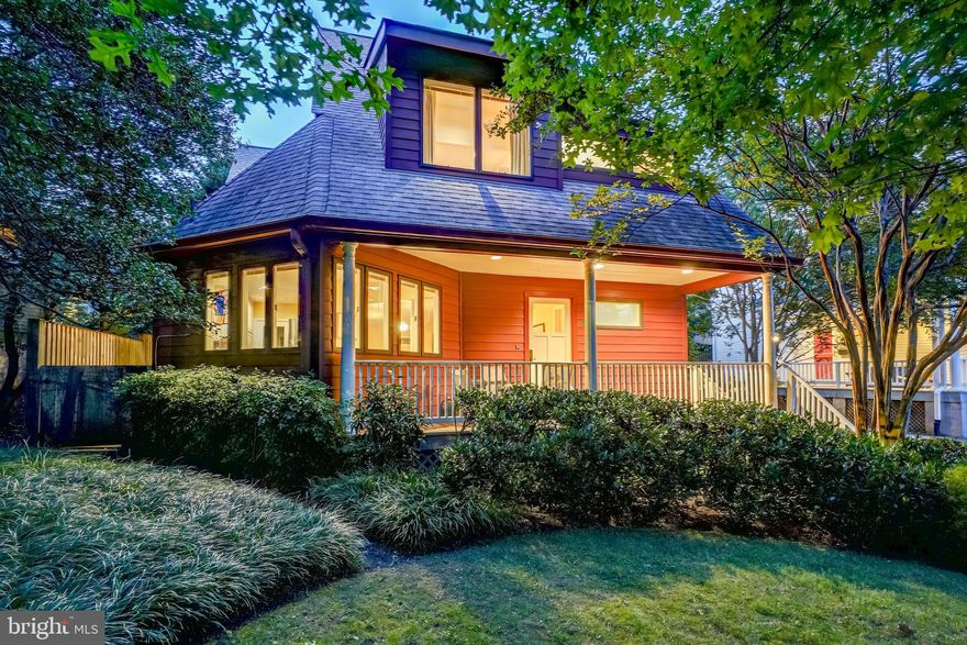 Welcome! To this stunning modern Bungalow that blends timeless architectural beauty with modern comfort, designed by renowned local architect Paul Treseder. This meticulously crafted home offers a perfect fusion of classic bungalow charm and contemporary flair, creating a truly unique living experience. Impeccable details are showcased throughout, including skylights, pristine hardwood floors, vaulted ceilings, custom built-ins, and casement windows. The enchanting covered front entry leads into a welcoming foyer and an elegant dining room with custom built-ins. Beyond the dining room, the expansive living room features large windows and cathedral ceilings, filling the space with natural light. The open layout allows the formal dining room to flow seamlessly into the living room, while the chef’s kitchen—equipped with a speaker system connected to both spaces—provides the ideal setting for entertaining. The gourmet kitchen is outfitted with Silestone countertops, wood cabinetry, a stainless-steel appliance suite, a five-burner gas cooktop, and a bright breakfast room. Step out from the kitchen to the covered rear terrace with Flagstone flooring, perfect for outdoor dining and relaxation. This level also includes a convenient laundry room and a half bath.
Upstairs, the second level features three generous bedrooms, skylights throughout, and two updated full bathrooms. The primary bedroom suite is a luxurious retreat, offering two wall closets, a walk-in closet with a custom organizing system, a sitting room, and a private bathroom with a double vanity and a shower with a built-in bench. A charming landing area with built-in display shelving leads to the recently renovated hall bathroom, featuring beautiful Porcelanosa textured tiles.
The third level, accessible by two separate staircases, offers two additional bedrooms, each with skylights and abundant storage in eave closets.
On the lower level, a spacious recreation room with track and recessed lighting provides plenty of space, while a workshop area and additional storage add to the home's practicality.
Outside, the picturesque, fenced backyard is filled with mature plantings, including Crepe Myrtles, Hydrangeas, Roses, and a stunning Magnolia Tree. The expansive stone terrace, brick pathways, and charming covered front porch further enhance the outdoor charm. For modern convenience, the home is equipped with a Tesla EV charger.
Ideally located close to Takoma Urban Park, local restaurants, shops, and just 0.7 miles from the Takoma Park Metro Station, this home offers the best of both worlds: the vibrant, eclectic community of Takoma Park and easy access to downtown Silver Spring. This beautiful home has it all – see you there!