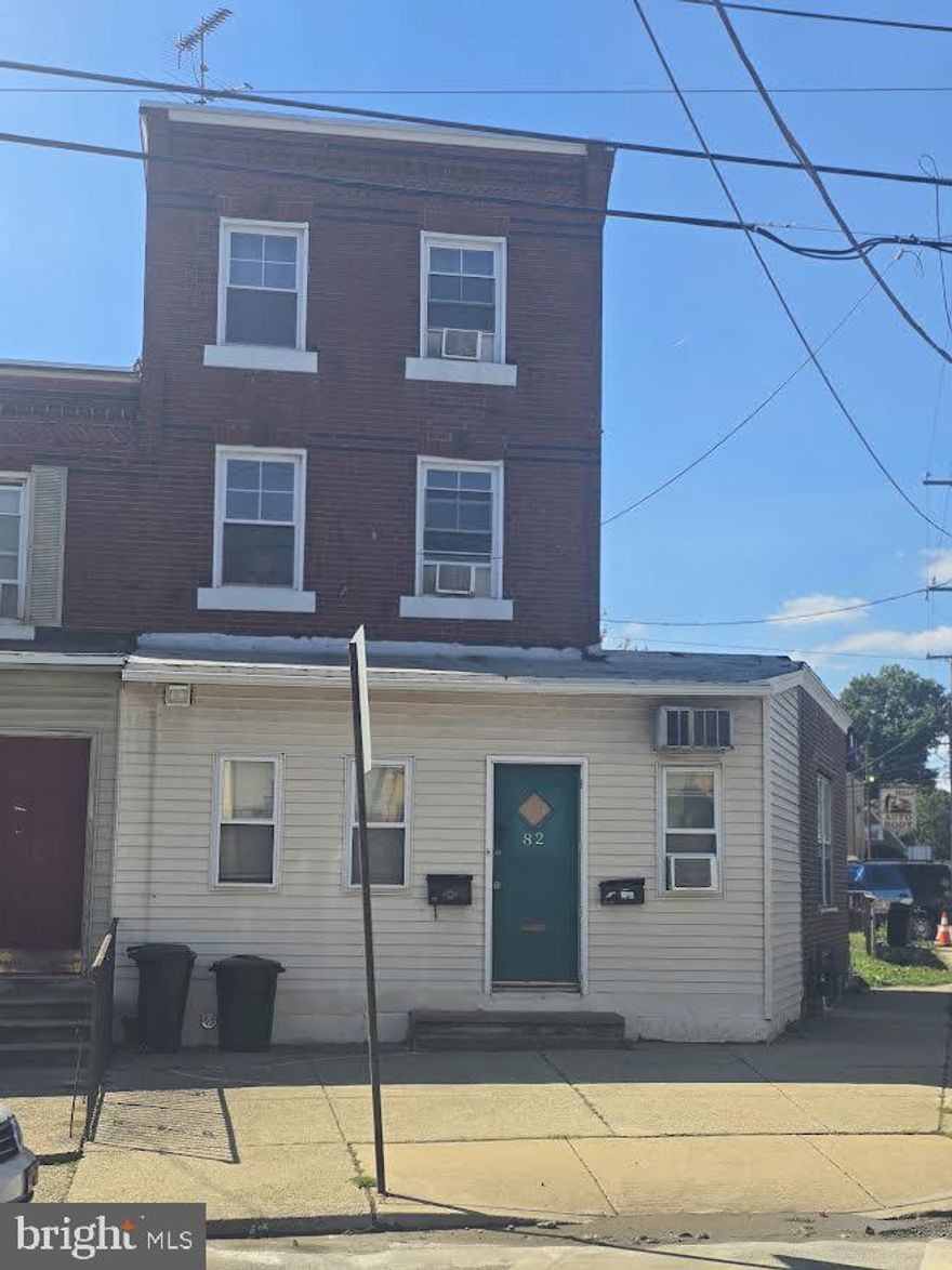 This first-floor unit offers a welcoming entryway and a small bonus room that works perfectly as an office, playroom, or extra storage. Inside, you’ll find a comfortable living room, one bedroom, a full bath, and a convenient laundry closet. Continue on to the second bedroom, a half bath, and a dining area that leads to a bright little nook with three large windows; great for plants or a cozy reading spot.
The updated kitchen opens right out to the backyard, where a concrete patio and space for a grill make outdoor cooking and relaxing easy.
Easy commute, washer dryer, refrigerator and basement access also included with this unit.