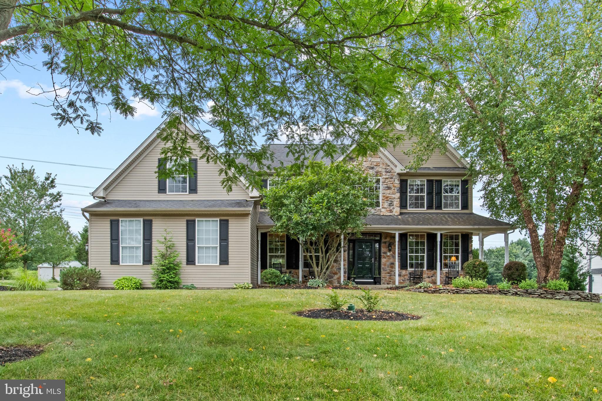 ** OFFER DEADLINE 8/11 BY 5PM** Welcome to 2272 Locust Drive in the highly desirable Milestone Development in Worcester Township, located in the award-winning Methacton School District! This stately 4-bedroom, 2 full and 2 half bath home offers over 3,000 square feet of living space above grade, with an additional 1,000 square feet of finished lower level—perfect for today’s modern lifestyle. Step inside to find hardwood floors throughout the first floor, a formal living and dining room with custom millwork, and a designated home office ideal for remote work. The heart of the home is the expansive gourmet kitchen featuring a custom island—perfect for prepping, cooking, casual meals, or entertaining. The kitchen opens to a spacious two-story family room anchored by a wood-burning fireplace. Upstairs, the primary suite boasts two walk-in closets. tray ceiling and a versatile bonus room —ideal for a nursery, home gym, or additional storage. Three additional generously sized bedrooms and a full hall bath complete the second floor. The finished basement provides endless possibilities with room for a playroom, game room, or media lounge—and includes a convenient half bath. Outside, enjoy the large level backyard from the covered patio, complete with a firepit—perfect for relaxing or hosting friends and family. The home is wired with a Christmas lighting package making holiday decorating a breeze. New HVAC installed 2024. Don’t miss your opportunity to own this exceptional home in a sought-after neighborhood with top-rated schools, easy access to local amenities like Merrymead Farm and Skippack Village shops and restaurants, easy access to major commuting routes and a true sense of community.