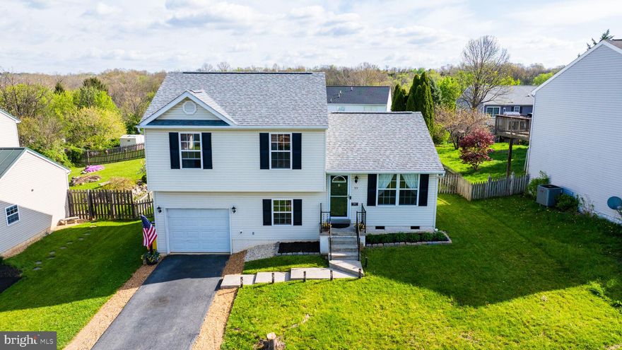 Welcome to this clean and spacious 3-bedroom, 2-bath home with an attached garage, nestled in the sought-after Clubhouse Manor community. This move-in ready gem features an eat-in kitchen, a separate laundry room, and a versatile utility room complete with rough-in plumbing for a potential third bathroom.  Step outside to enjoy the large, fenced-in backyard—perfect for outdoor activities and entertaining.  Recent updates include a newer roof and HVAC system, offering peace of mind for years to come.  Best of all, you're within walking distance to Opequon Creek with public access—ideal for fishing, kayaking, or simply enjoying the water.