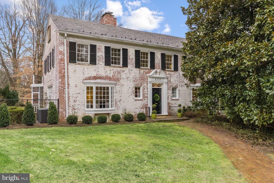 HOUSE UNDER CONTRACT - OPEN HOUSE CANCELED! Gorgeous white-wash brick colonial on a idyllic level lot of nearly half an acre with pool and overlooking parkland - YES, PLEASE! One of just a handful of homes on prestigious Linnean Ave adjacent to Linnean Park, this exceptional 1941 residence with approximately 4,400 square feet of livable space has been beautifully updated and renovated, including new kitchen and primary bath, newer systems and more. A gracious center hall foyer with stunning curved staircase opens to a generously sized living room with fireplace and dining room. The living room overlooks the gorgeous and mature boxwood and rose gardens in the enclosed side yard, and french doors open to a screened porch which walks out to a level rear yard, a 40' heated pool, and sweeping parkland views. The renovated kitchen with breakfast area is adjacent to the wood paneled library with fireplace, rear-facing bay window seat and built-in bookcases, all with parkland views. The upper level is home to five bedrooms and three full baths, including a primary suite with a newly renovated primary bath and a private balcony. A potential sixth bedroom/bonus room plus office area and abundant storage are found on the third level. The lower level includes a large recreation room with fireplace, laundry, powder room, storage and access to the attached two-car garage. Across Linnean Avenue is the Peruvian Ambassador’s residence, which encompasses 25 acres and is the largest privately owned homesite in DC. Rock Creek Park is a few blocks away, with its many trails and tributaries, including nearby Soapstone Trail. Just off of Connecticut Avenue and close to Downtown, Georgetown and Bethesda/Chevy Chase, Forest Hills affords an easy commute to neighboring Maryland and Virginia via commuter routes, including Rock Creek Parkway, major Avenues, the Beltway, and Van Ness Metro. Shops and restaurants are also nearby, including favorites Bread Furst, Sfloglina, Politics and Prose and Buck's Fishing and Camping. Recently renovated and popular Forest Hills Park is within blocks and neighbors enjoy a play area, fields, tennis courts and basketball court. Noted for its beautiful homes, lovely architecture, mature trees, fabulous proximity and wonderful community, Forest Hills is one of Washington's premier and most sought-after neighborhoods. If you've been watching, you know it is hard to find a property that is not only this special, but that also sits on nearly a half acre and backs to parkland (and with a pool!) - be sure to see this one quickly!