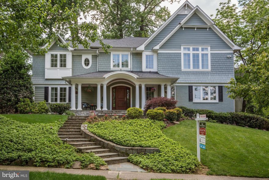 Architect-inspired renovations complete this breathtaking 6-bdrm, 5.5-bth home on over a 1/4-acre lot. Gourmet kitchen w/GE Monogram appliances, granite countertops, & wine fridge. Picture windows, hardwood on main & upper levels. Master bedroom w/en suite spa-like bathroom & 2 walk-in closets. Fully finished basement leads to generous 2-car garage. Walk out patio & professionally landscaped yard.