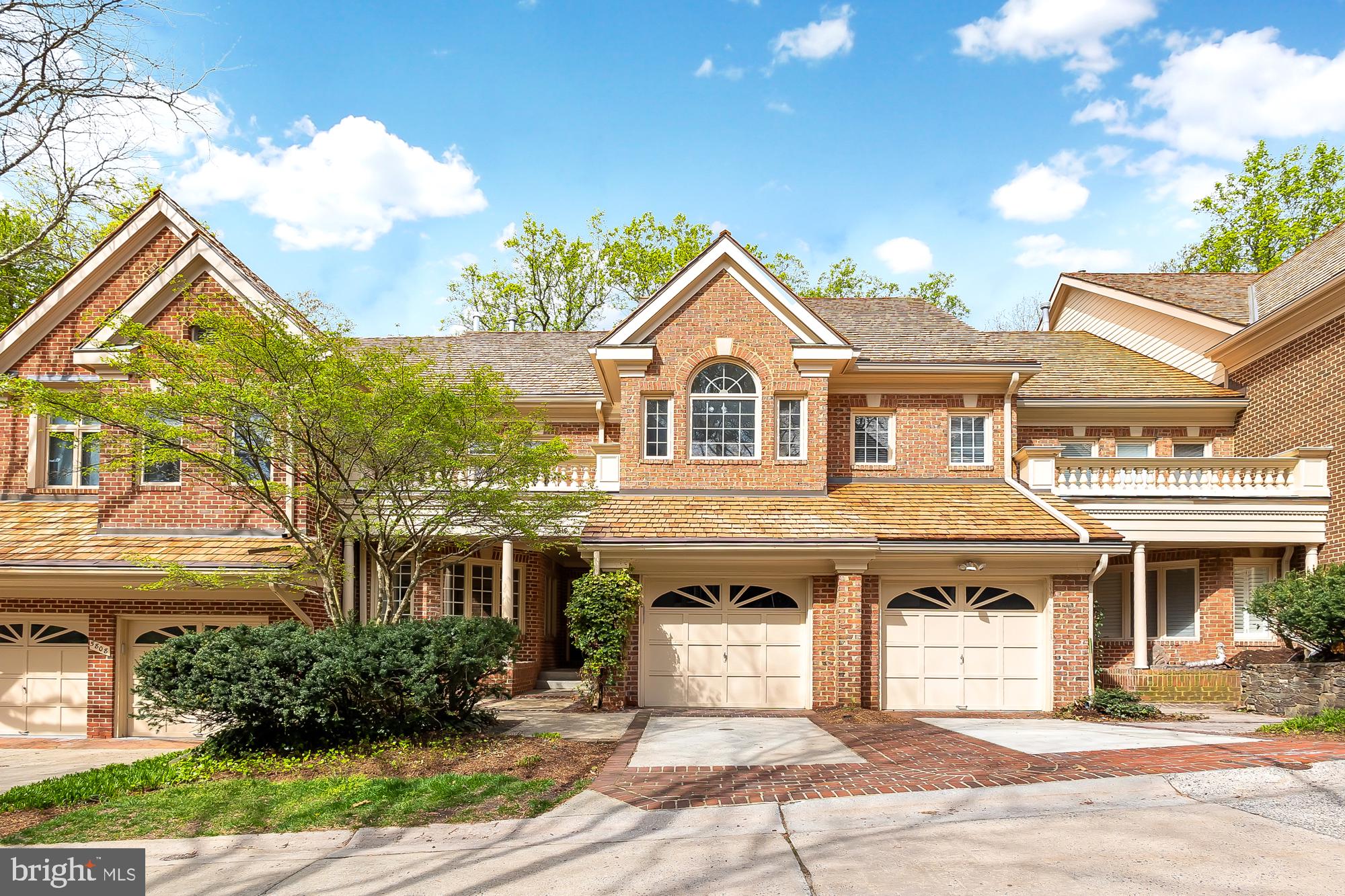 Nestled in the highly coveted Bethesda enclave of Brookmont, this tri-level townhome offers a tranquil retreat with the convenience of urban living. Venture beyond the stone gatehouse and follow the private road to discover serene and intimate Carlton Place, where spaciousness and elegance await.
As you step into the home, you're greeted by an inviting main level boasting an updated kitchen, complete with a Subzero refrigerator, Jenn-Air gas cooktop, granite countertops, and a double oven. Adjacent to the kitchen is a breakfast area ideal for enjoying your morning coffee.
The main level also boasts a spacious living room with a fireplace, offering abundant natural light through skylights and direct access to one of two private decks. With its serene outdoor oasis overlooking lush greenery and trees, this creates an extension of the living space perfect for relaxation and enjoyment. Additionally, the main level includes a dining room, study, and powder room, providing a well-rounded living experience.
Ascend to the upper level, where you'll find the owner's suite—a luxurious retreat with a fireplace, an oversized walk-in closet and a recently renovated spa-like bathroom featuring a soaking tub, shower, dual vanities, and water closet for added privacy. This level also includes two additional bedrooms and a renovated bathroom.
On the lower level, an inviting family room awaits, complete with a fireplace and wet bar. Additionally, there's a fourth bedroom with custom built-ins, a full bathroom, laundry room, and ample storage space. For added ease, there is an electric car charging plug installed in the garage.
Conveniently located just minutes from the C & O Canal, Capital Crescent Trail, Metro, shops, dining, and Sibley Hospital, this home offers unparalleled convenience. With a monthly HOA that includes benefits like landscaping, snow removal, exterior painting, leaf removal, roof maintenance, and gutter cleaning, you’ll enjoy carefree living at Carlton Place.