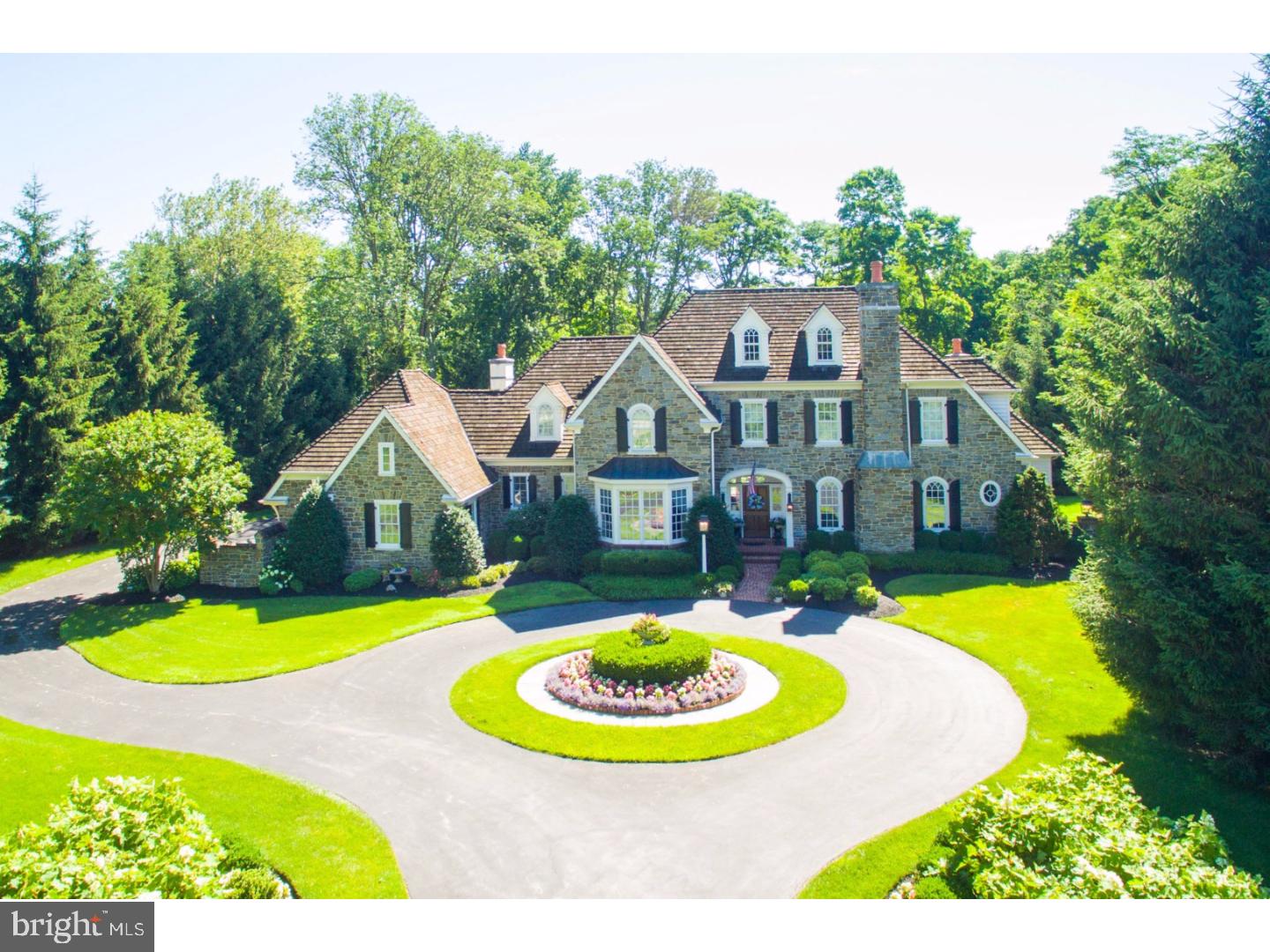 Located in the prestigious Estate area of Villanova this custom built Pohlig home is unsurpassed in quality and elegance. Arched Doorways, Coffer Ceilings, Custom Millwork and beautiful Wainscoting define the true craftsmanship of this home. This property offers an elegant lifestyle in a tranquil setting yet is convenient to all that the Main Line and center city Philadelphia have to offer. This approximate 2-acre lot overlooking preserve area is on a quiet cul-de-sac surrounded by mature landscaping. A First Floor Master Suite differentiates this home in a unique way. It includes a spa type Bath, with Stall Shower and separate Jacuzzi Tub, a Dressing Area and large outfitted Walk-in Closet. The Through Center Hall Foyer is bound on the right by a sun-drenched Living Room with a marble surround Gas Fireplace, custom designed windows and a Music Alcove with built-ins. To the left is a formal Dining Room with Wainscoting and Crown Molding. A Butler's Pantry and Wet Bar are adjacent to the Dining Room . In addition, there is a Work Space/Desk Area hidden from the kitchen center but easily accessible for computer work or daily planning. There are 2 Powder Rooms. One formal for guests and one near the Mud Room and Laundry Room. The Mud Room with plenty of storage also includes a Potting Sink, Pantry Closet, Coat Closets and Custom Shelving with an entrance to both the 3-car attached garage or directly to the outside. There is a separate Laundry Room. the Stately kitchen is complete with state of the art appliances (Wolf range inclusive of a warming oven, a double self-cleaning oven, a Miele dishwasher and large double sink, 2 Subzero refrigerator/ freezer combinations). There is an oversized island with sink and seating for coffee or lighter meals. The Breakfast Room and a large Family Room area share this great space. The Family Room has built-ins, a Coffer Ceiling, a large gas fireplace with marble surround. Surround sound system wiring is in place for audio components. Wonderful flow for Summer entertaining is enhanced by the French Doors that lead from the Family Area, Foyer and Library to the Covered porch and extended Flagstone Patio with built in Gas grill. A quiet evening can be enjoyed as well as you view the exquisite grounds and colorful perennial garden. The Lower Level is truly spectacular and includes Family Room with Bar an Exercise Room, a Game Room, Sauna, Full Bath, Wine cellar and full Bedroom.
