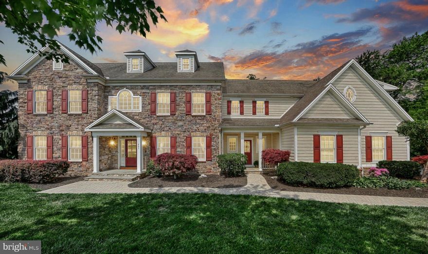 Farinelli custom estate in Upper Allen Township, Braeburn Estates offers a unique opportunity for an unparalleled living experience. Originally listed at $1.2 million, this stunning home has recently been adjusted to $1,099,000, presenting a significant savings of $100,000. This reduction provides you with an incredible opportunity to personalize your dream living space, whether you envision adding a luxurious pool or designing a custom lower level tailored to your preferences. At just $215 per square foot, this custom Farinelli estate represents unbeatable value, especially considering its prime location on a private 0.86-acre homesite that borders a serene 5-acre nature preserve. This home truly exemplifies timeless character and unsurpassed quality, evident in its gorgeous stone and Hardie Plank masonry on all four sides, Andersen 400 series windows, and more. As you step inside, you'll be captivated by the grand foyer, featuring a striking staircase with a built-in window seat, and a gallery walk. The stunning 23x16 vaulted great room is a true masterpiece, showcasing hand-lathed, furniture-grade rafters, built-in bookcases, and a gas fireplace. The gourmet kitchen is a chef's dream, featuring high-end appliances, granite countertops, custom cabinetry, a center island, a peninsula island with an overhang, and a ceramic tile backsplash. The breakfast nook, with its abundance of windows, provides a bright and airy atmosphere that almost doubles as a sunroom. On the other wing of the home, you'll find a private office, full bath, and a versatile sixth bedroom that can easily serve as a playroom. The owner's retreat offers a private sanctuary with a tray ceiling, a luxurious dressing area, and a spacious walk-in closet. The spa-inspired opulent bath features a corner jetted tub, an impressive tile shower with a glass enclosure and body jets, separate vanities, a makeup area, and heated tile floors. For added convenience, the enormous laundry room on the same floor is designed with built-in shelves, counters for folding, and drying racks. This impressive luxury estate boasts 6 bedrooms, 4.5 bathrooms, and 5,100 square feet of beautifully appointed living space, showcasing extensive custom trim throughout. You'll appreciate the elegant touches such as lighted tray ceilings, wainscoting, shadow boxes, crown moldings, and custom bookshelves. A mud room that doubles as the communication hub. Hand built lockers with bench, owner coat closet and entry, and a planning desk with charging area, and a second staircase enhancing both functionality and aesthetic appeal. The exposed walkout lower level offers over 2,200 square feet of unfinished space including a rough-in for a full bath, a wall of windows, and a glass door leading to a paver patio overlooking a beautiful waterfall pond. Additional features include 4 zones of heating/cooling and a 3-car side-entry garage. Braeburn Estates is an exceptional custom community nestled in the heart of Central Pennsylvania. It is conveniently located near Route 15 and the PA Turnpike, making it a premier neighborhood and an integral part of the esteemed Smart Growth community of Winding Hills. Residents enjoy over 180 acres of preserved open space, complete with walking trails, woodlands, and integrated parks. The community's thoughtful design features charming cobble roundabouts, sidewalks, and streetlights, all leading to a central social hub with a grand clubhouse, gym, and saltwater pool.