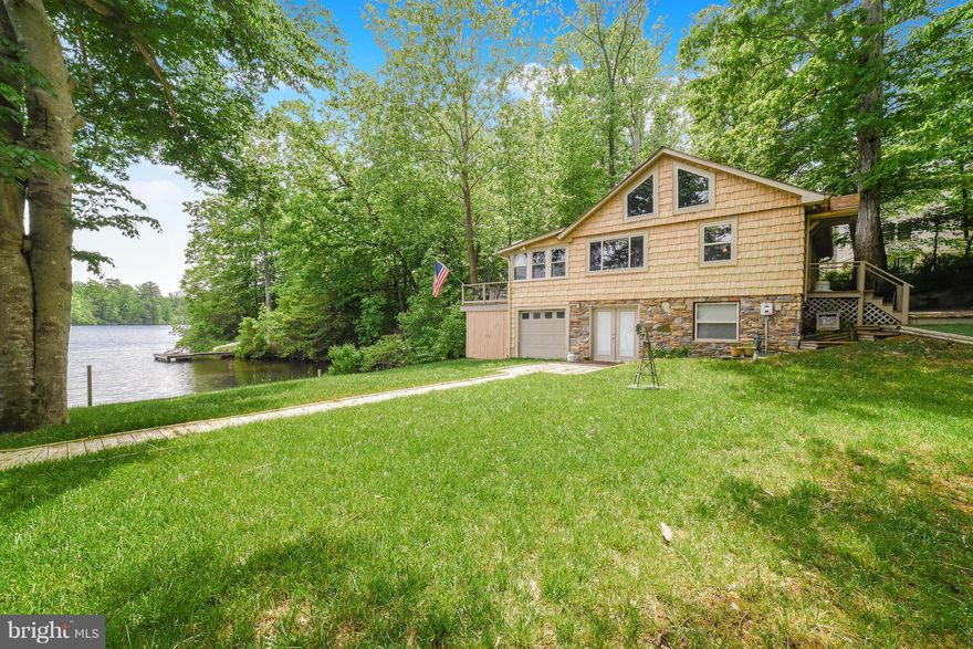 This Cabin is sure to recall summertime at the lake. This serene view is a beauty. The charm of the main floor cabin with terrific lake views is perfect for relaxing or entertaining friends. The newly finished basement area and bath with Steam Shower allow lots of space. The garage area will  provide excellent space for storage. Why reminisce of summers at the lake when you can live it.