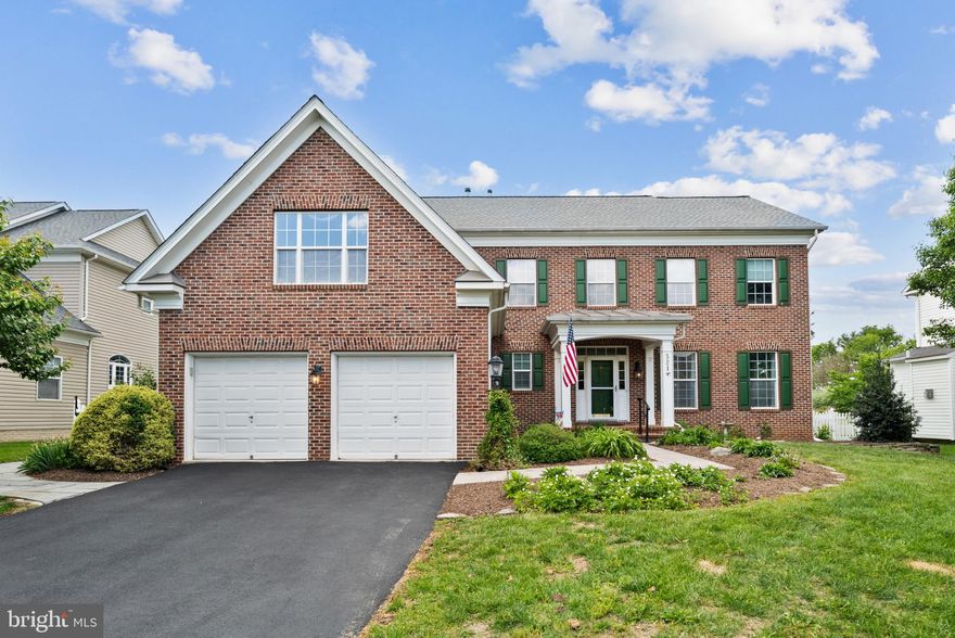 Experience the pinnacle of Berryville living. This meticulously maintained brick-front colonial offers over 4,000 square feet of sophisticated living space, but the true "wow" factor lies just beyond the back door. <br /><br />
The Ultimate Outdoor Oasis<br /><br />
Skip the two-year wait for construction—this home features a professionally designed hardscape and gunite (concrete) inground pool completed with no expense spared. The backyard has been transformed into a five-star retreat with extensive custom hardscaping, including an oversized slate patio, native plants, bushes, and trees, and ambient landscape lighting. Included in the sale is a complete raised garden system for your own organic fruits and vegetables! Whether you’re hosting summer soirées or enjoying a quiet evening swim under the stars, this is the outdoor living space you’ve been dreaming of. <br /><br />
Gourmet Interiors & Grand Proportions<br /><br />
Inside, the home radiates elegance with 9-foot ceilings and an abundance of natural light. The heart of the home is the chef’s gourmet kitchen, featuring premium cabinetry, a massive center island, and high-end appliances that flow seamlessly into the soaring family room with its cozy gas fireplace. <br /><br />
• Primary Suite: A true sanctuary featuring a tray ceiling, dual walk-in closets, and a spa-inspired ensuite with a spectacular 2-person shower.
• Space to Grow: Four generous bedrooms upstairs and a fully finished walk-out basement, with space used as a bedroom and another full bath offer the perfect footprint for a home theater, gym, or multi-generational living space.
• Laundry: Optional placement of washer and dryer on main level or within the primary suite.<br /><br />
The Full-Scale 2026 Interior Transformation<br /><br />
Step inside to a home that feels—and functions—like brand-new construction. No detail was overlooked in the recent top-to-bottom remodel, ensuring years of maintenance-free luxury: <br /><br />
• Pristine Surfaces: The main level gleams with expertly refinished site-finished hardwoods, while all-new designer paint in a modern, neutral palette flows through every room. Upstairs, you’ll find plush, high-traffic carpet in every bedroom, providing a soft and quiet retreat.
• The Reimagined Primary Suite: The crown jewel of the interior is the redesigned primary bathroom. It has been transformed into a spa-like sanctuary featuring a massive two-person custom shower with dual rain heads and high-end tile work. For ultimate convenience, a dedicated laundry area was seamlessly integrated into the suite—a true luxury feature rarely found in this floor plan.
• Mechanical Peace of Mind: Enjoy total comfort and efficiency with all-new dual-zone HVAC units, ensuring the home stays perfectly tempered year-round with the latest energy-saving technology.
• Cohesive Exterior Flow: The luxury continues from the front door to the back. The original slate walkways and rear patio have been professionally refreshed, perfectly complementing the pool and providing a seamless transition between the home’s classic architecture and its breathtaking outdoor resort.<br /><br />
Prime Location<br /><br />
Situated in the desirable Darbybrook community, you are minutes from the historic charm of downtown Berryville and local favorites like the Clarke County Fairgrounds. With easy access to Route 7, you have the perfect balance of small-town serenity and a convenient commute to Winchester, Leesburg, and beyond.  Unique to a select few homes in this neighborhood, she backs up to a quiet walking path.