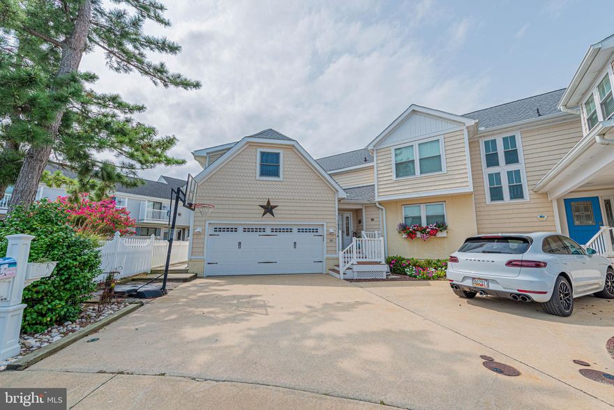 Absolutely Beautiful Updated Townhouse with fantastic Wide Waterview.  Located in Caine Woods, not far from the beach.  Appox 90 feet of updated bulheading. 2 Boat Lifts and 1 Jet Ski Lift. Large Open downstairs floor plan with water views everywhere.