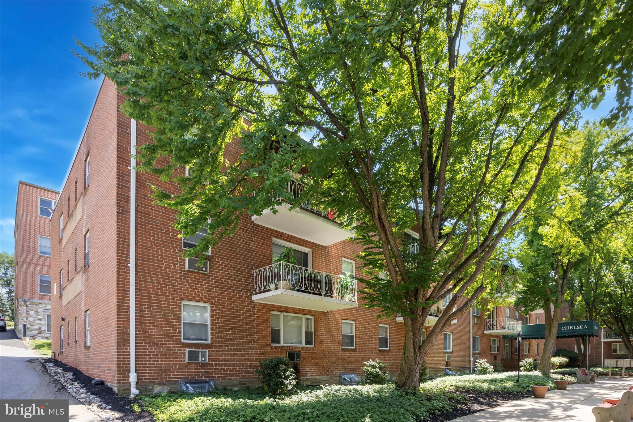 Welcome to 1600 Church Rd #C-207, a stunning condo in the heart of Wyncote! This corner-unit home boasts 2 bedrooms, 1.5 bathrooms, and 923 square feet of living space. Enter into the spacious open floor plan layout and be greeted by refinished hardwood flooring with plenty of room for a living/dining space. The kitchen features tile flooring, newer countertops, tile backsplash, and generous cabinet storage. The unit has 2 spacious bedrooms that feature new carpeted flooring, ceiling fans, and ample closet space. The full bathroom has a newer vanity, sink, medicine cabinet, and light fixture. This home also has updated light fixtures, a recently installed AC unit in the primary bedroom, a new thermostat, updated electrical switches and outlets, and has been freshly painted throughout. Residents enjoy elevator access, a private parking lot, shared laundry, and a private storage locker in the basement. Located two blocks from Arcadia University and in close proximity to all of the restaurants, churches, coffee shops, gyms, and grocery stores that Wyncote has to offer, this home is in a perfect location. Schedule your showing today!